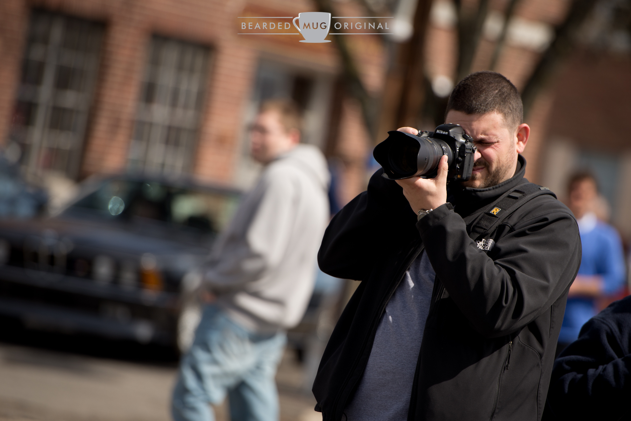 Fellow smart shooter, working his Nikon with the venerable 70-200 F2.8.