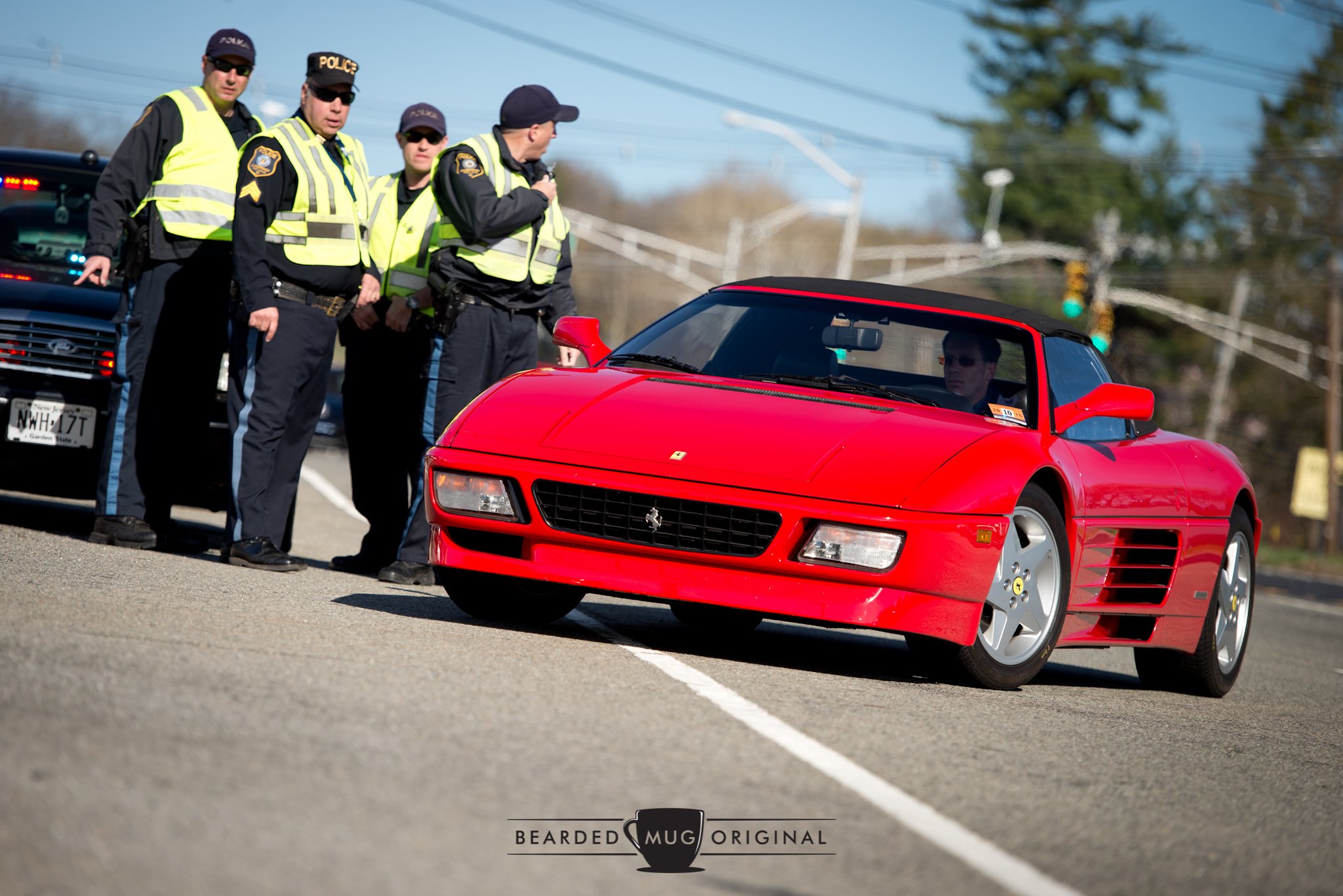 Ferrari 348 enjoys extra protection while making the right-hander ino the lot. 