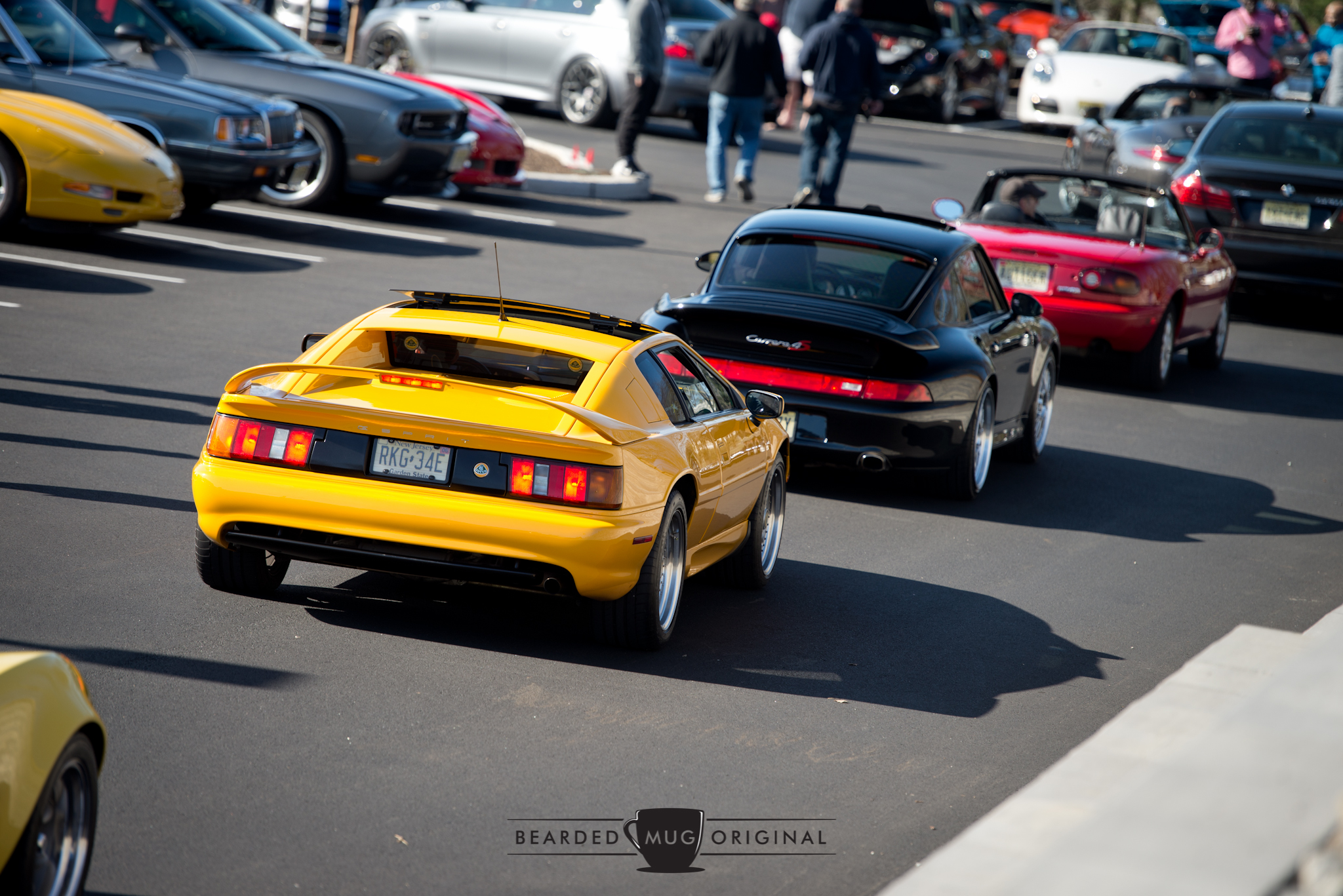 C&C covers all continents, as expressed in this small slice of the cars that showed up. Yes, that's a K-Car convertible, and yes, it was near-mint.