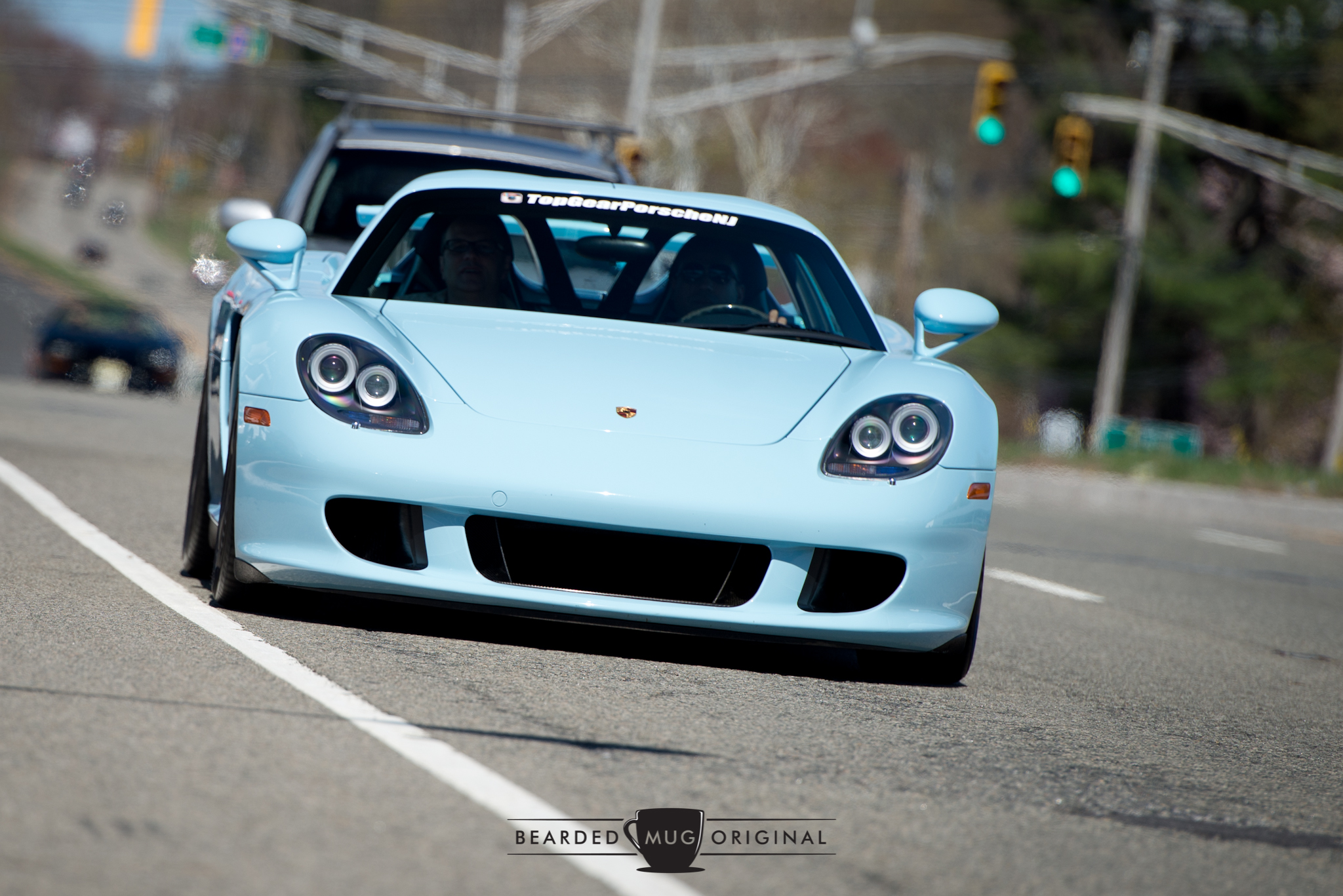 Top Gear Porsche brought out their Gulf Blue Carrera GT. If you look closely, you can see the heat from the engine disturbing the air above it.