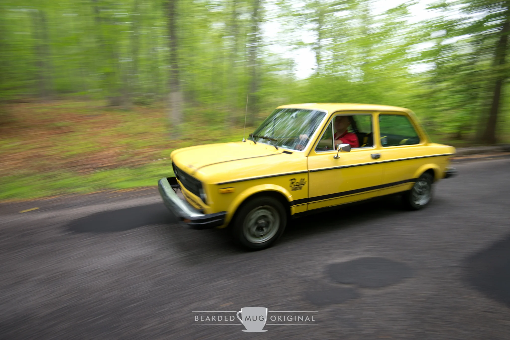 1977 Fiat 128 Rally Homologation built specifically for the US market buzzed right on by.