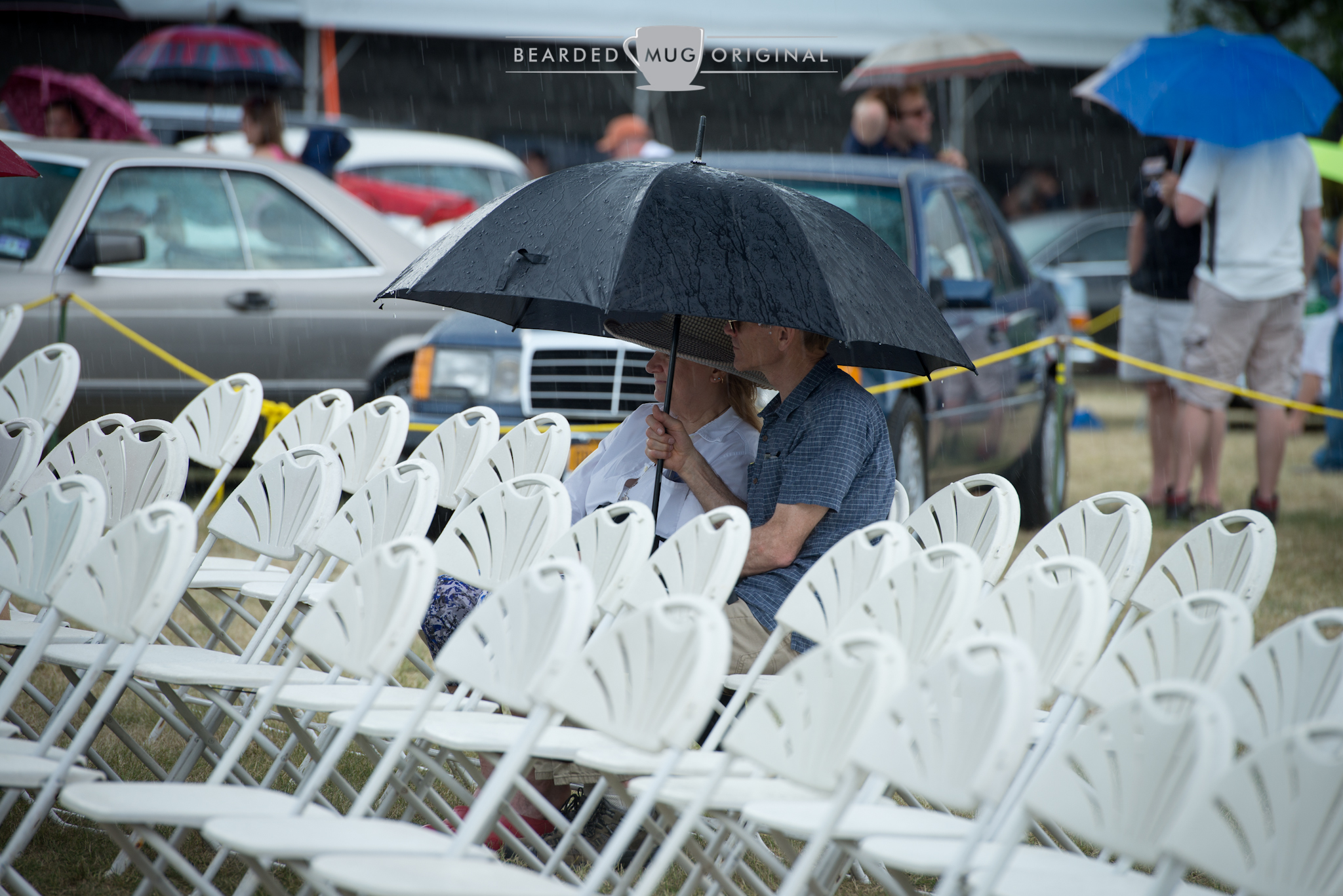 It seems these folks did not want to give up their seats and waited out the rains, heavy at most times, until the show continued.