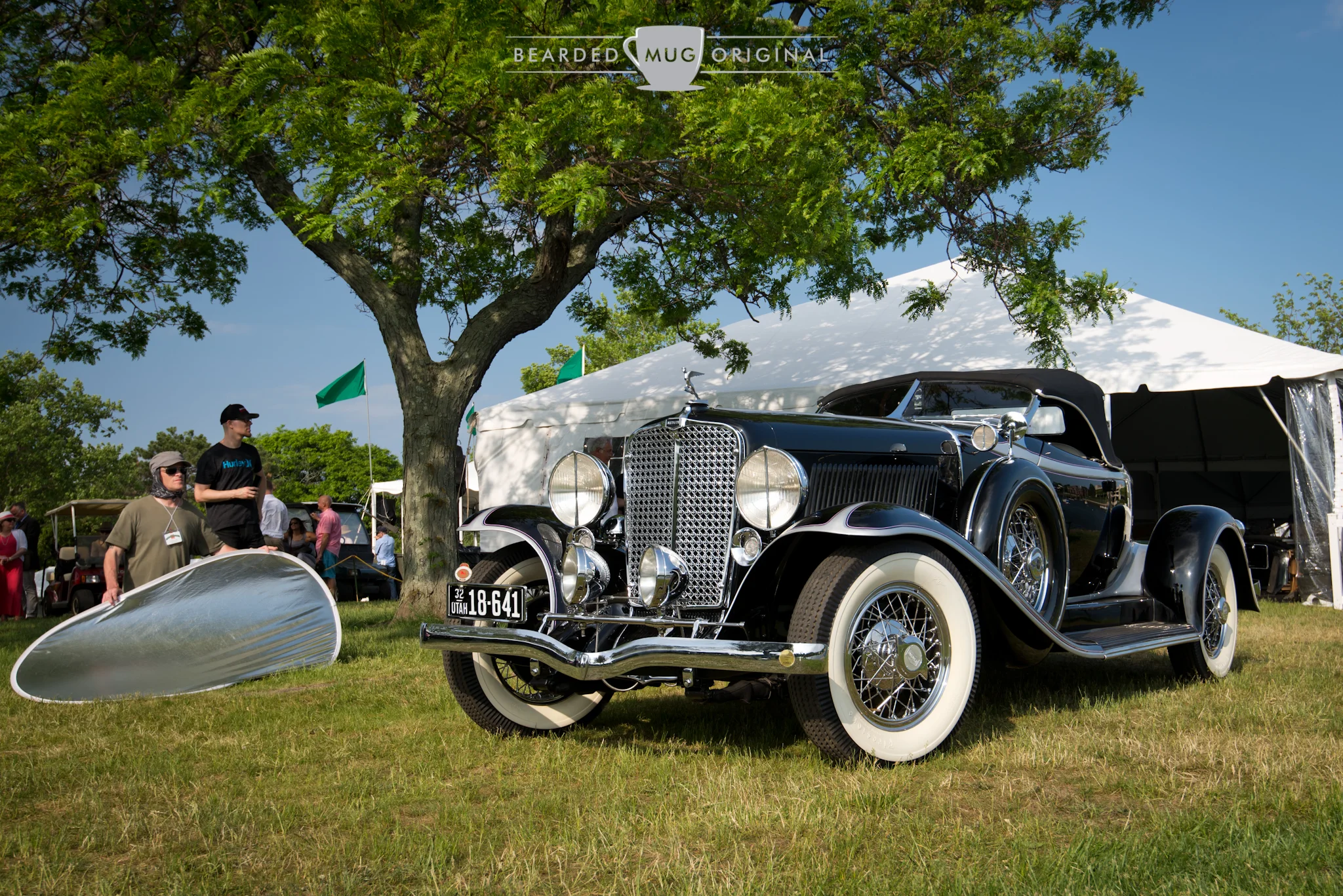 The notorious reflector, providing absolutely no fill light in the shadows of this People's Choice 1932 Auburn 8-100A Custom Deluxe Boattail Speedster, one of just 84 produced. The Custom Deluxe model featured the different grill and covers on the side-mounted spares, among other fine details.