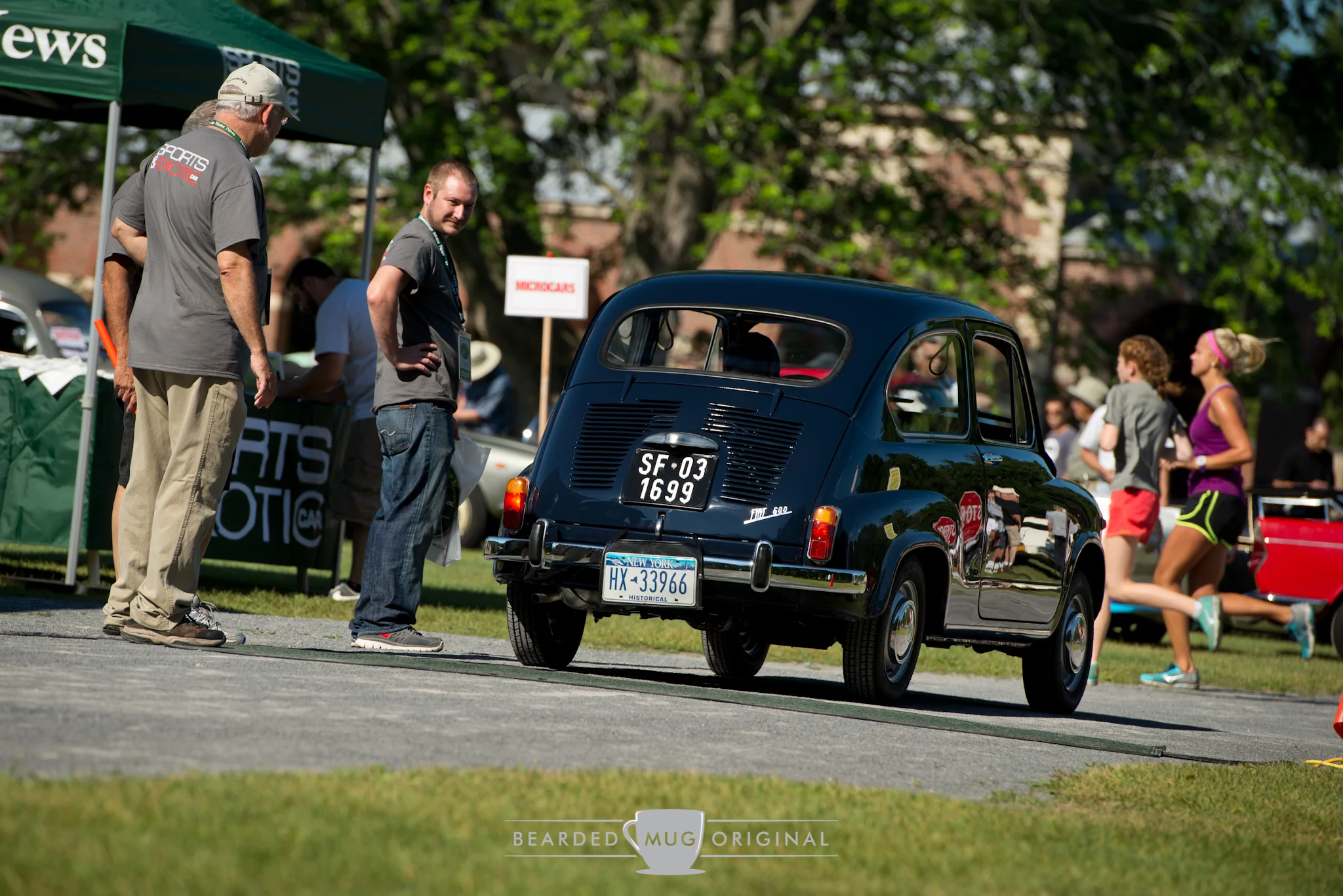 Fiat 600 was admired by the editors as unimpressed joggers trotted by.