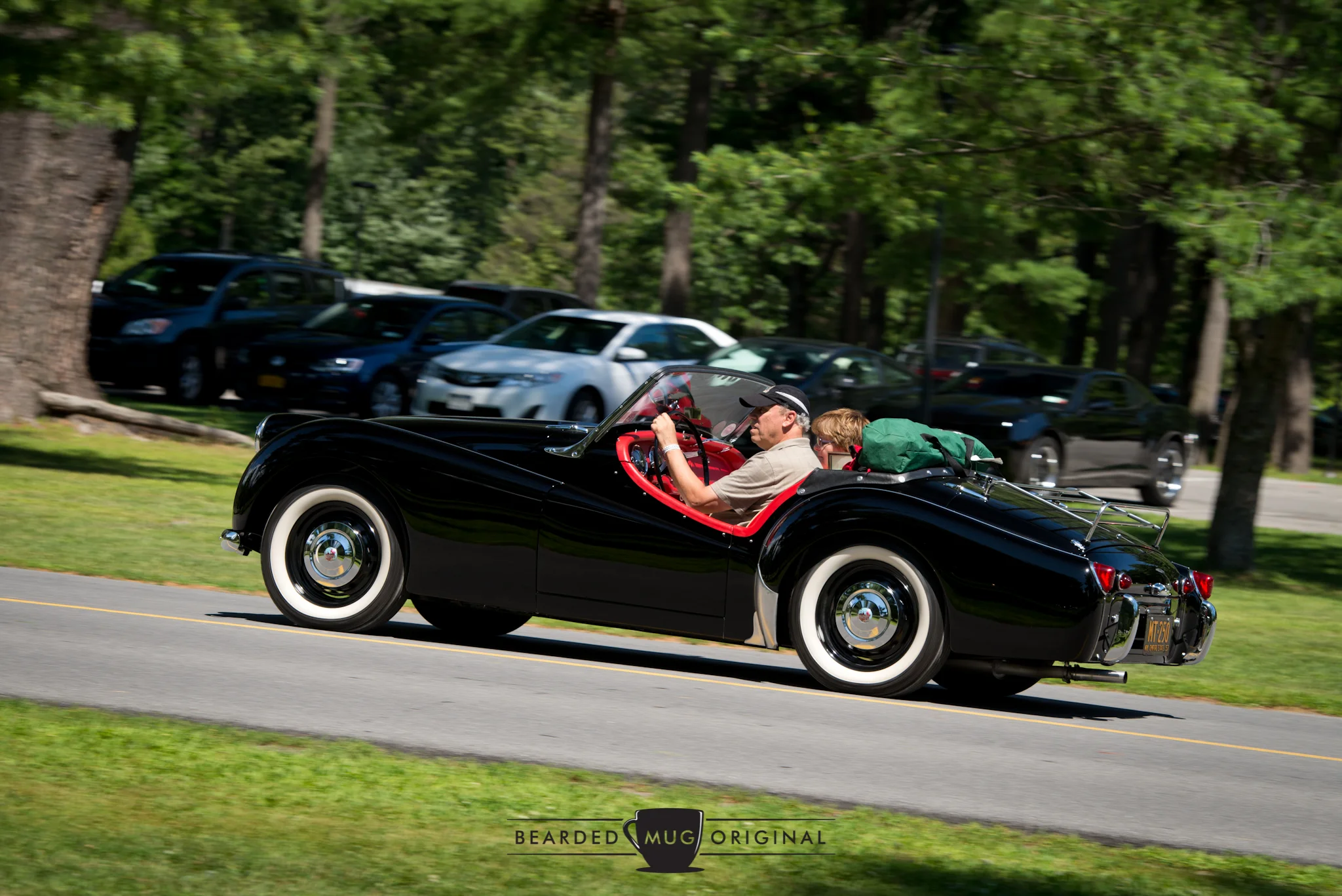 1957 Triumph TR3 owned by Gene and Glenda Tricozzi was another former Best of Show in attendance.