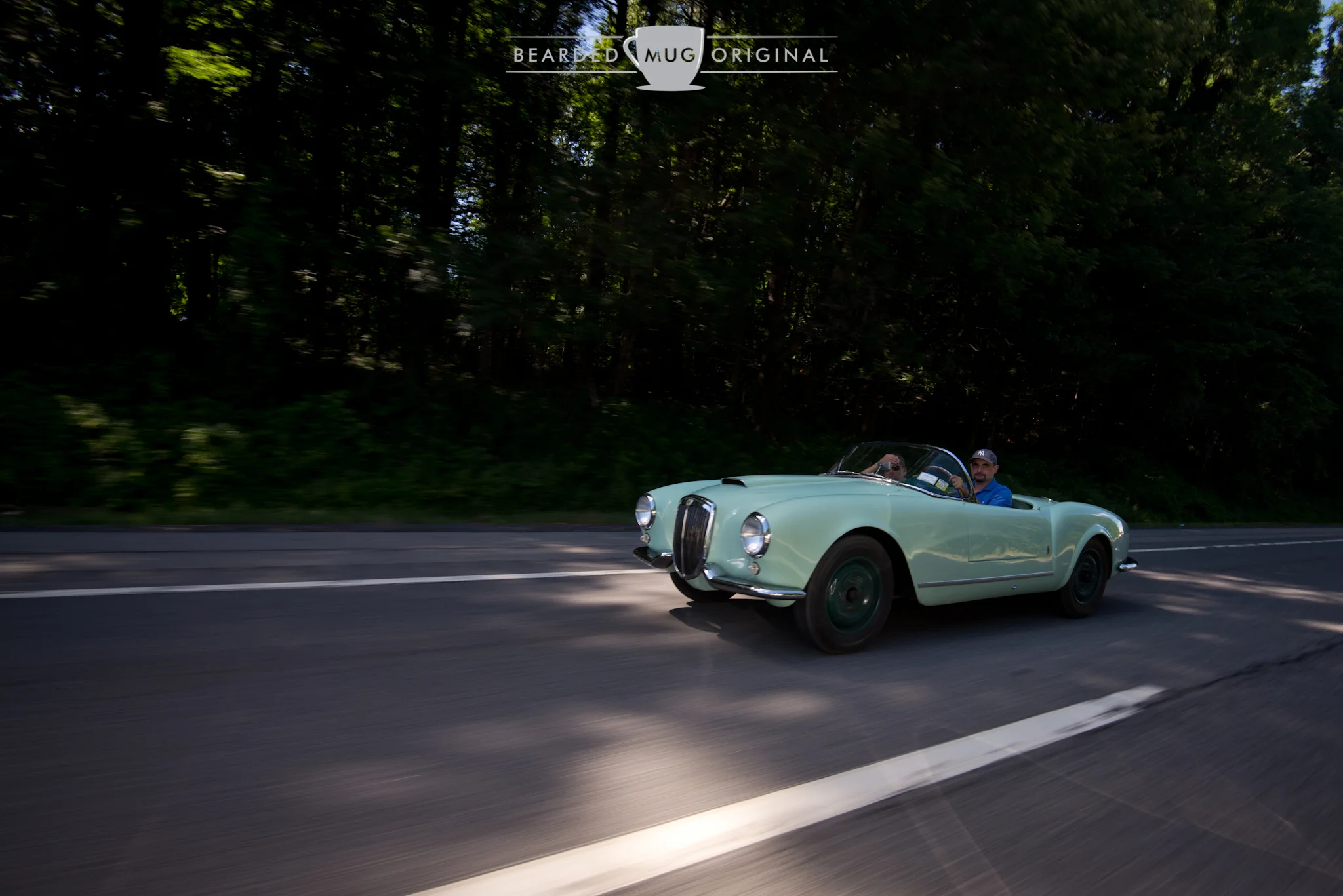 After chatting with the owner of this 1955 Lancia Aurelia Spider at a gas station, I slowed down on the highway to allow him to catch up to capture this shot.