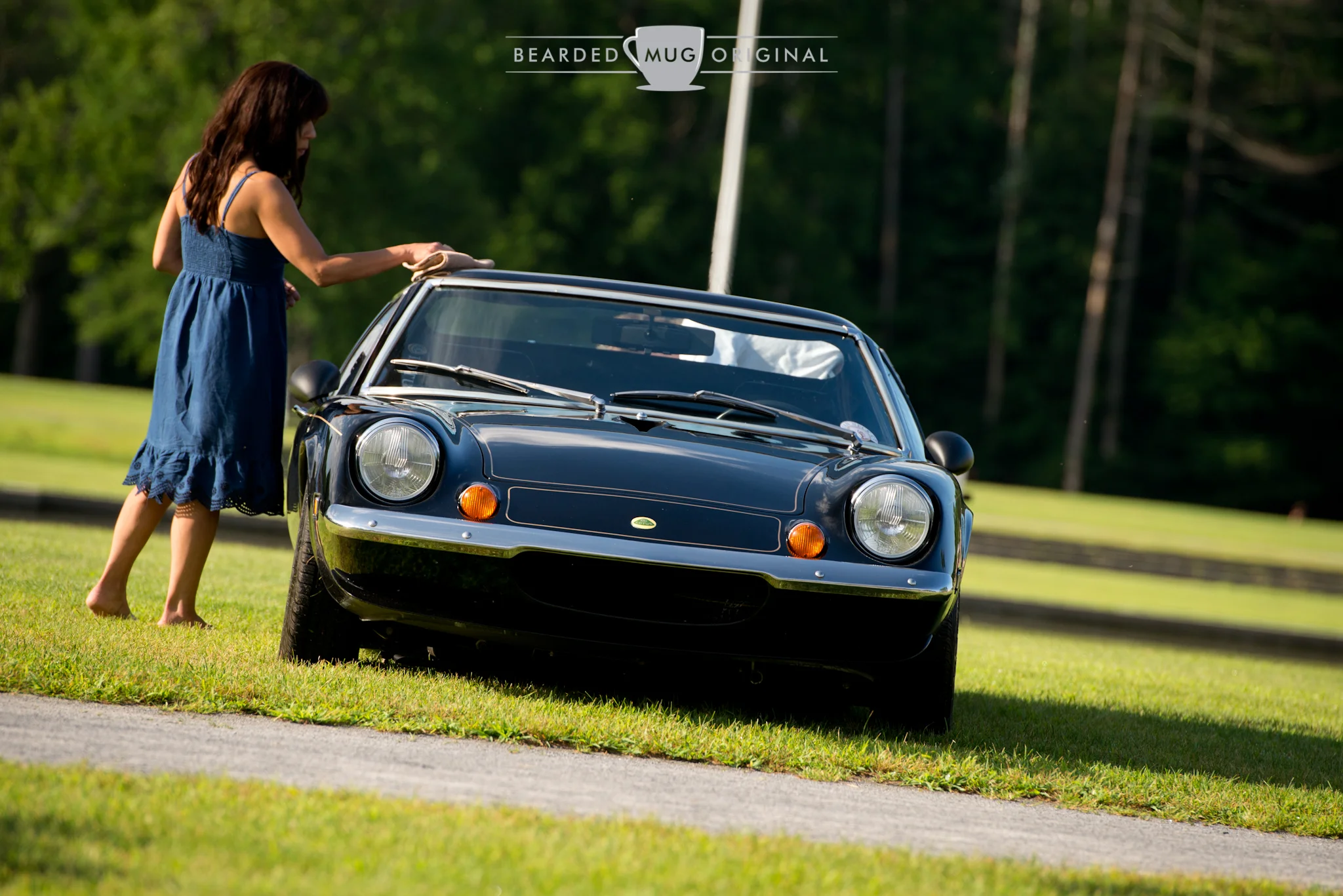 The Lotus Europa is such an oddball car, yet there were three in the marque's parking area!