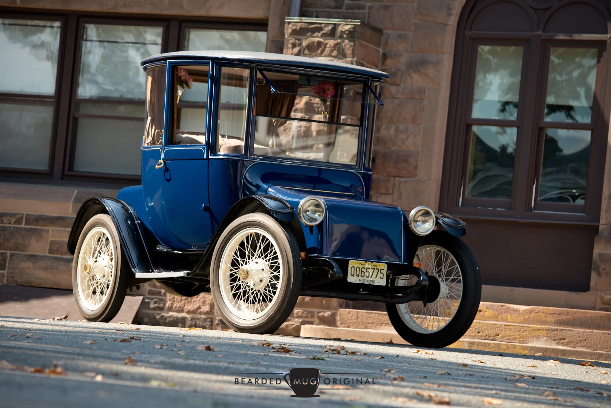 The size of the 1917 Detroit Electric Model 68 can't be fully appreciated until you're standing next to it. Its height accommodated for hats, so the roof was much taller than today's cars.