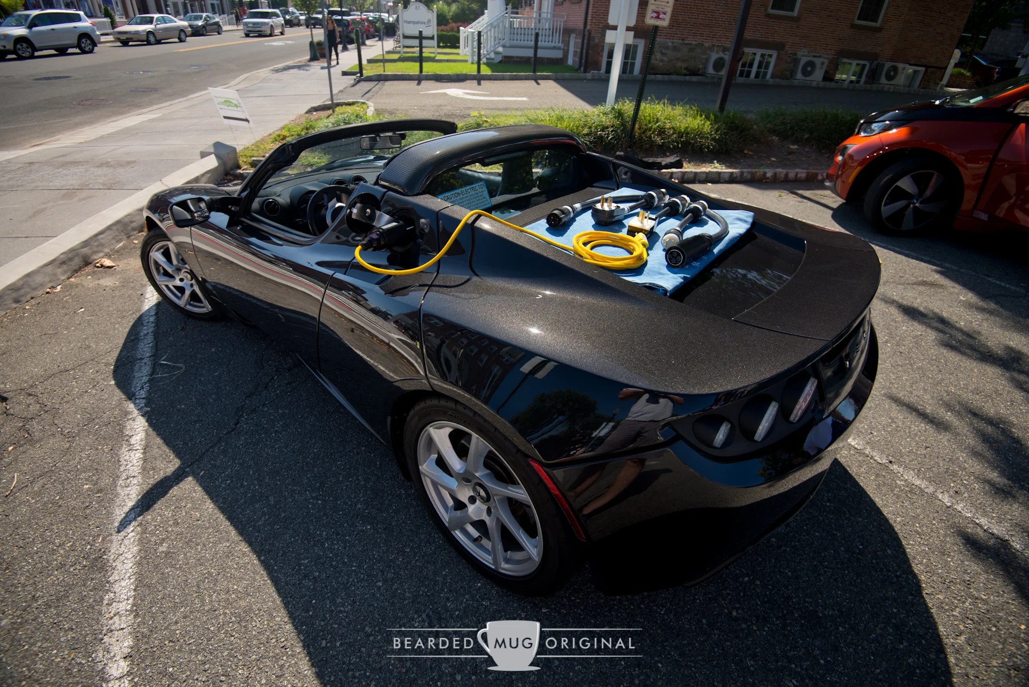 Ian's display of chargers and plugs at the recent EAA car show in Morristown.