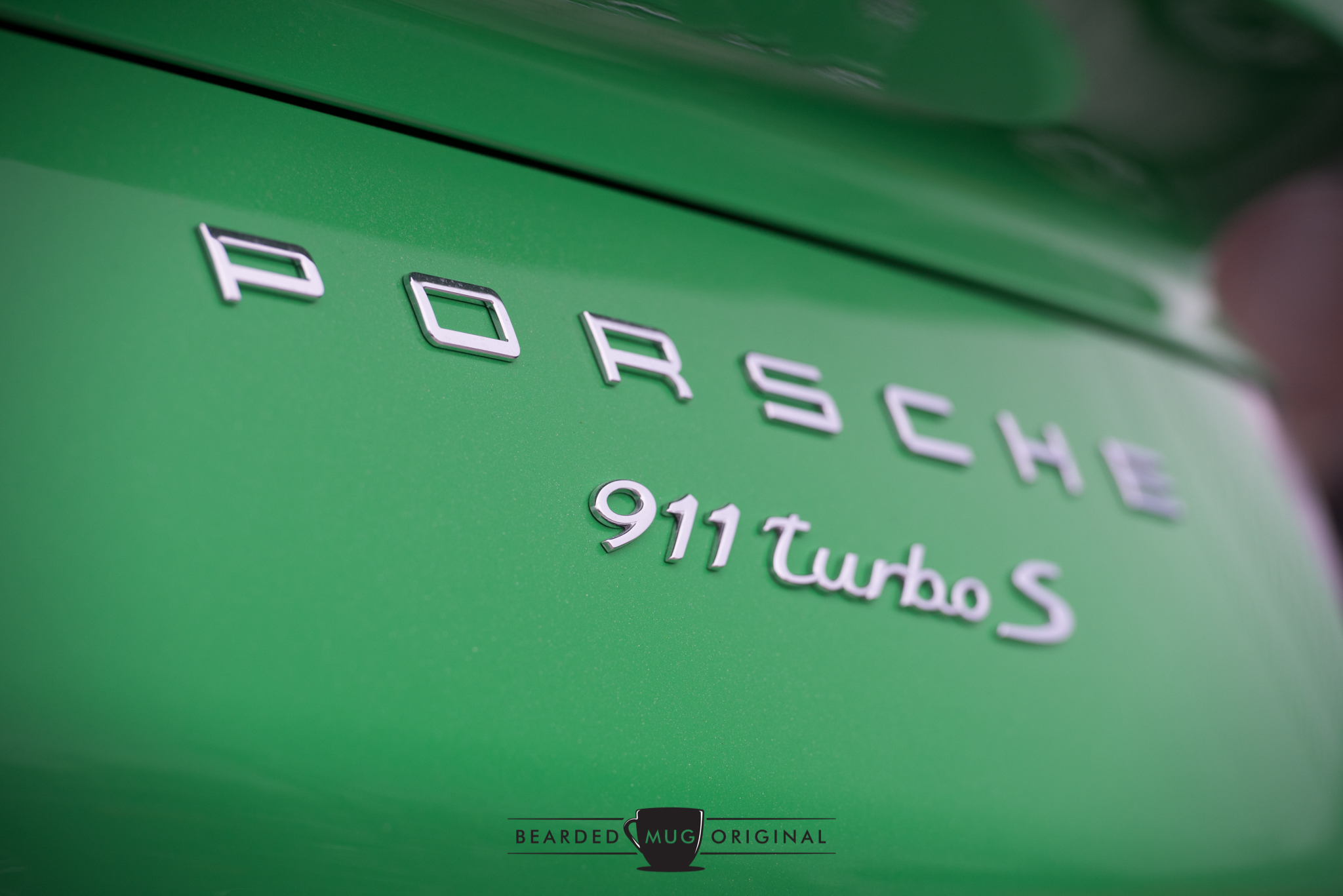 'PORSCHE' across the engine cover is an excellent way to connect to the car's past without invoking too much nostalgia.