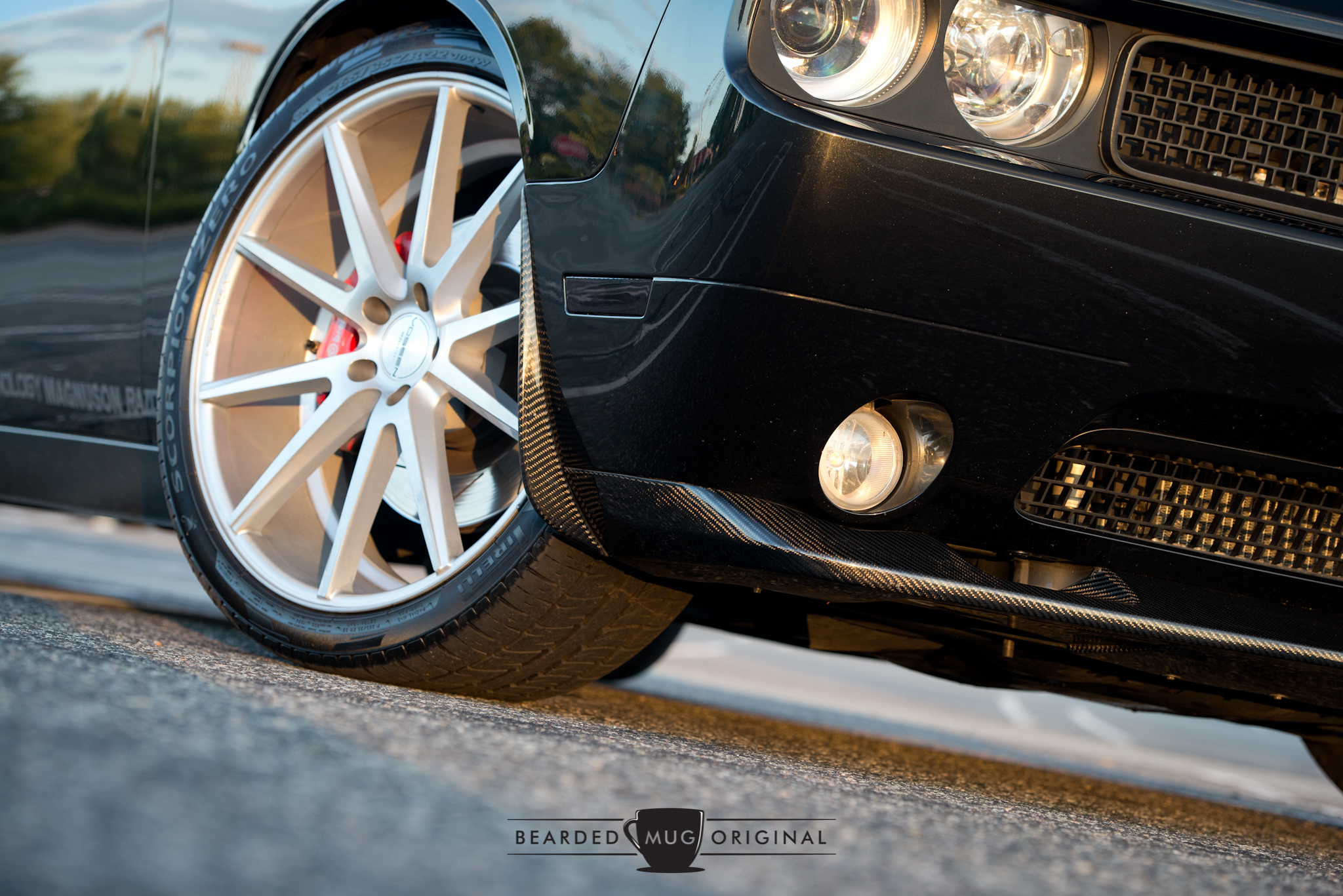 The late day sun really does a great job of highlighting the carbon trim and the Vossen wheels.