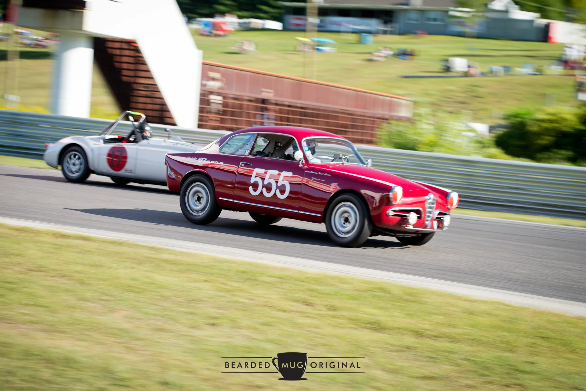 The '555' Alfa taking the inside, and overtaking an MGA, coming into Big Bend at Lime Rock Park.