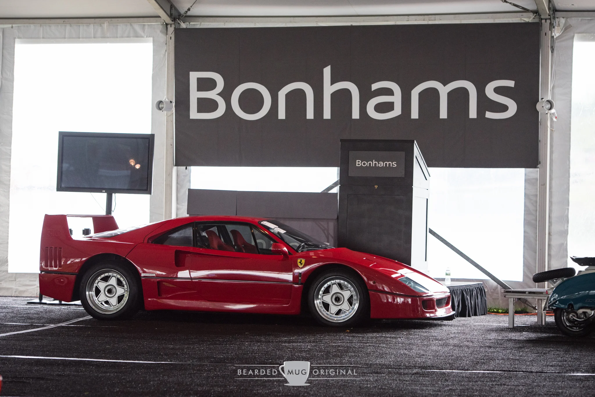 This 1989 Ferrari F40 was a European model with less than 9,000 kilometers on it. The original Rosso Corsa paint was still present and was very thin in areas, exposing the weave of the carbon fiber that lurks beneath it.