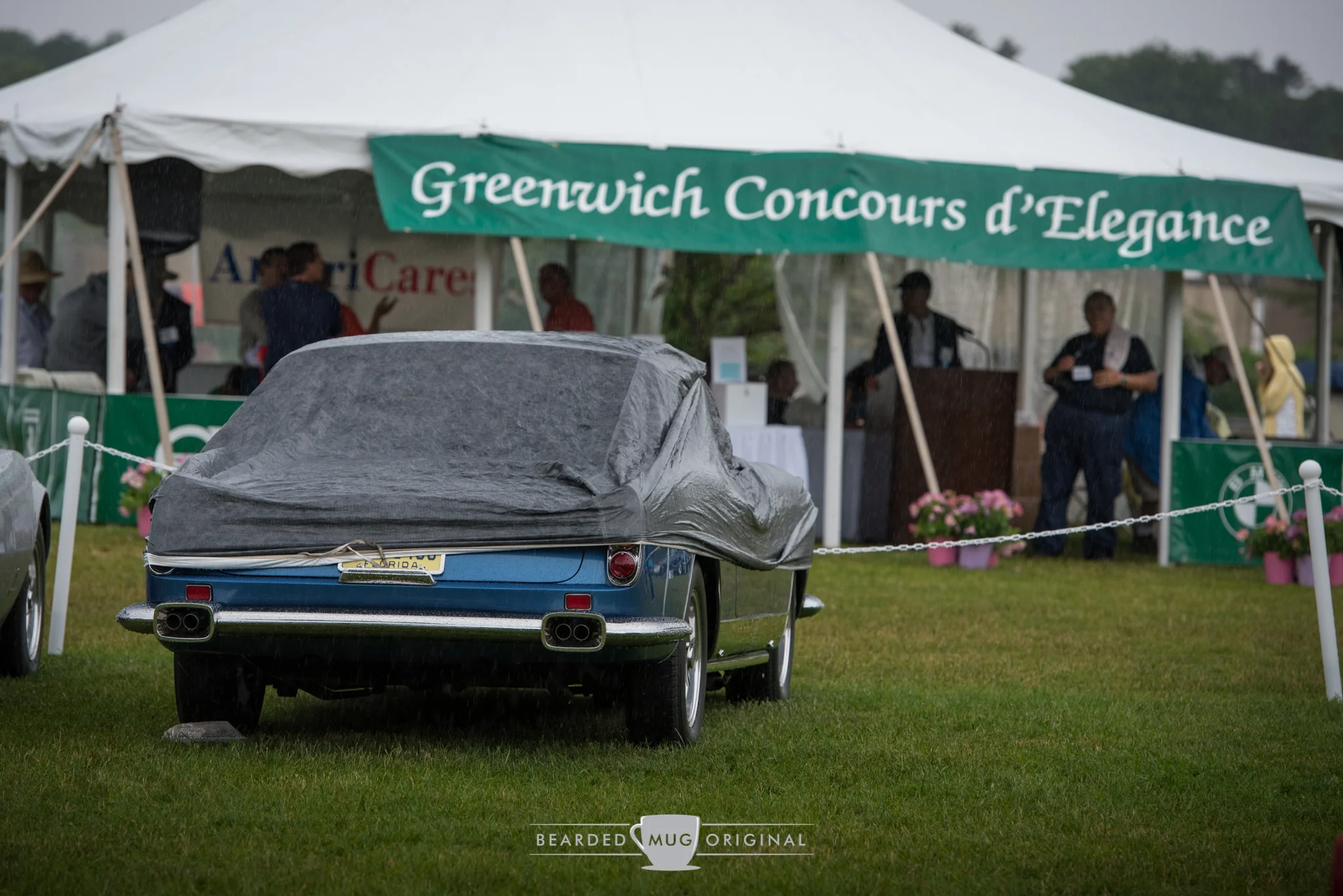 The 1961 Ferrari 400 Superamerica PF Cabriolet as seen from a different perspective than that portrayed on the Concours program cover. 