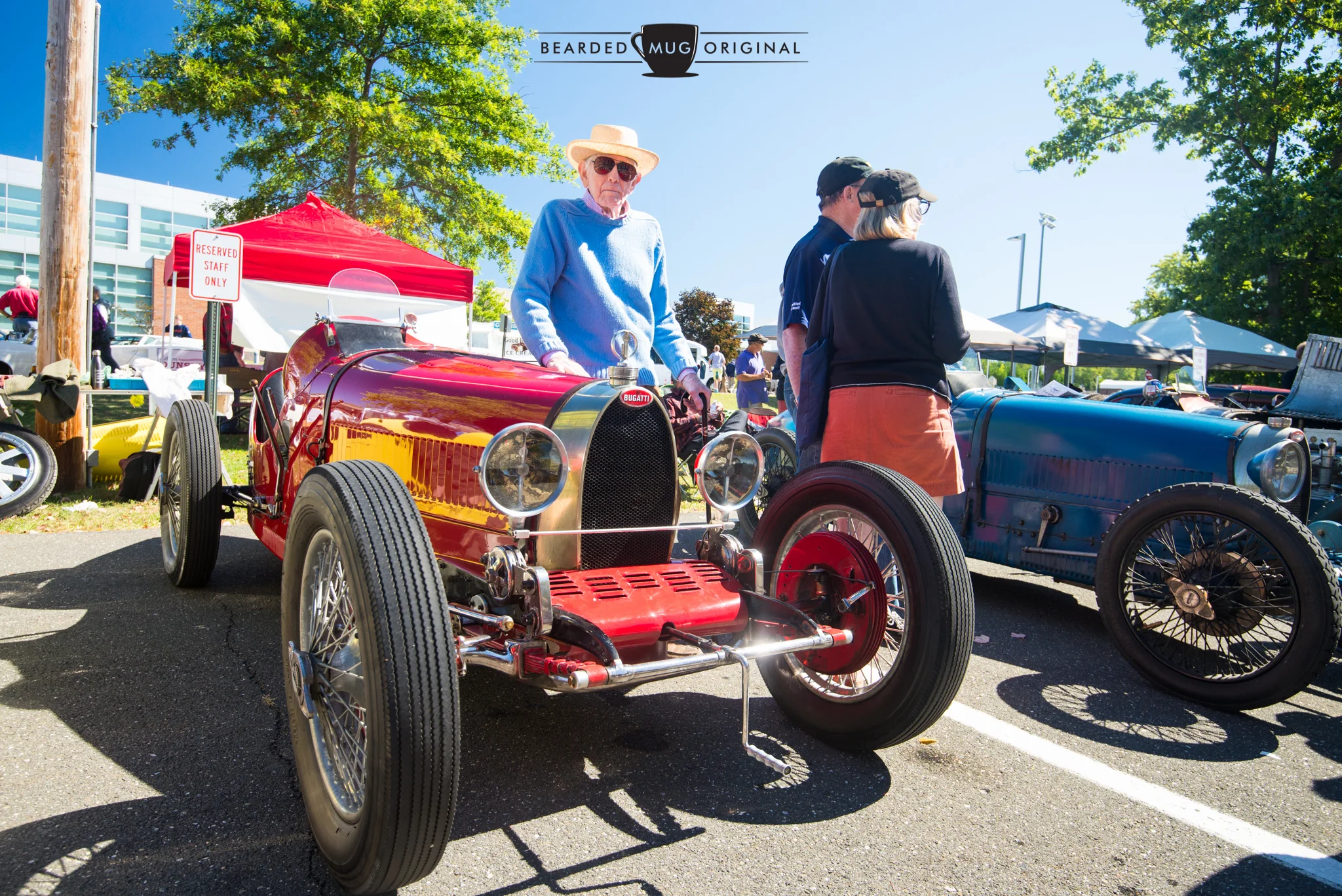 Alden Sherman stands proudly next to his Bugatti Type 35 that he drove himself to the show.