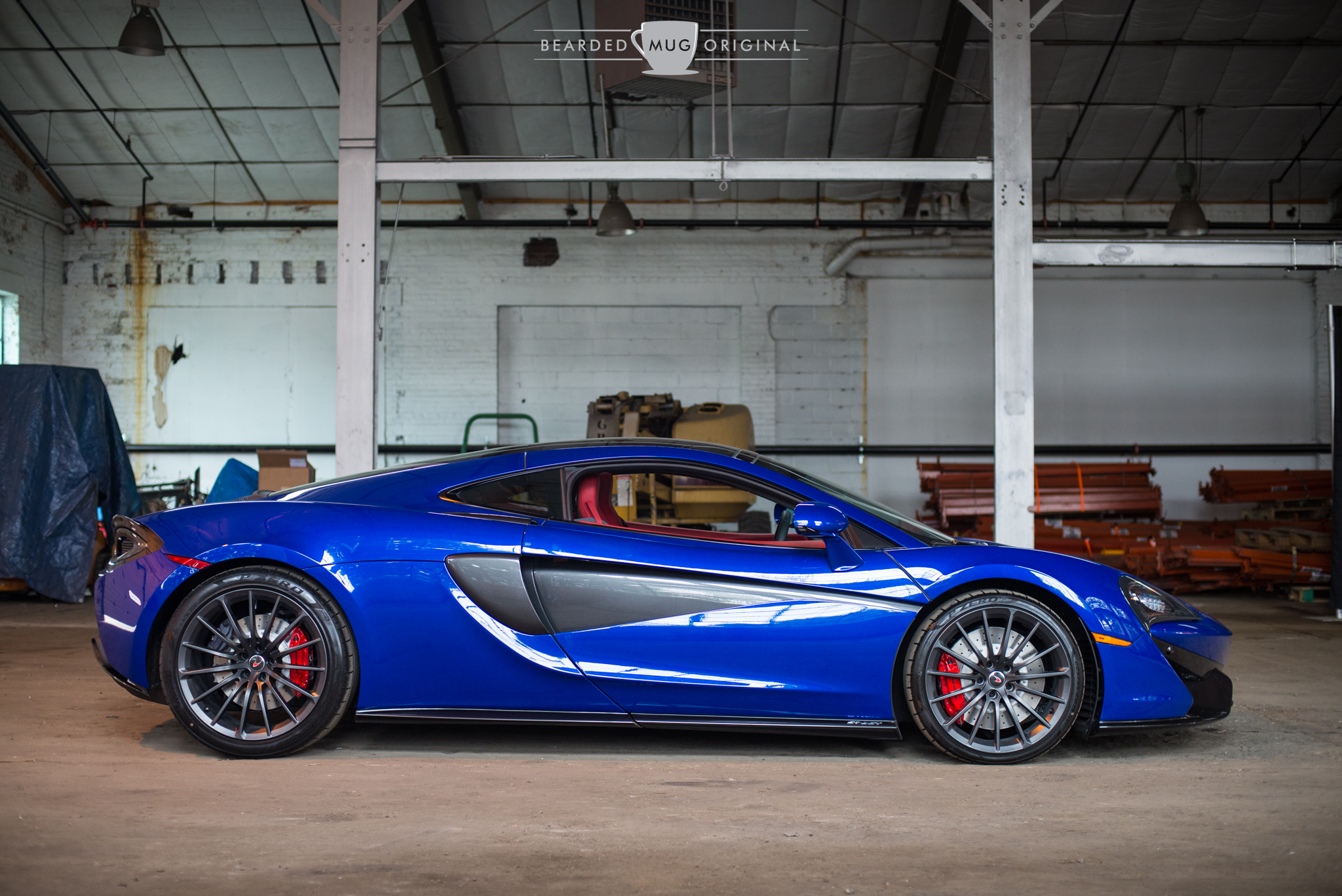 The McLaren 570GT is slathered in Aurora Blue, a specially ordered MSO color. 