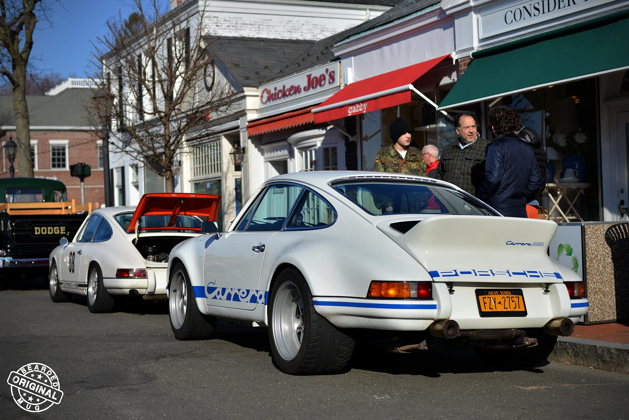 TwoWhitePorsches.jpg