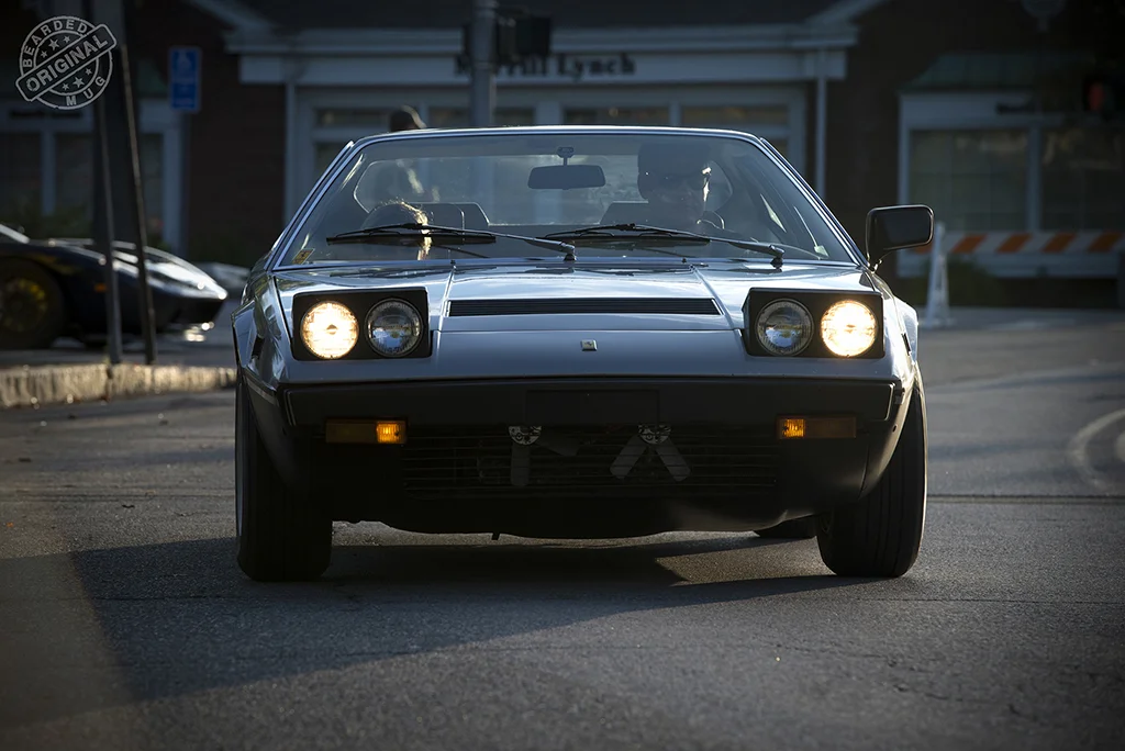 Dino308GTBsilverFrontEnter.jpg