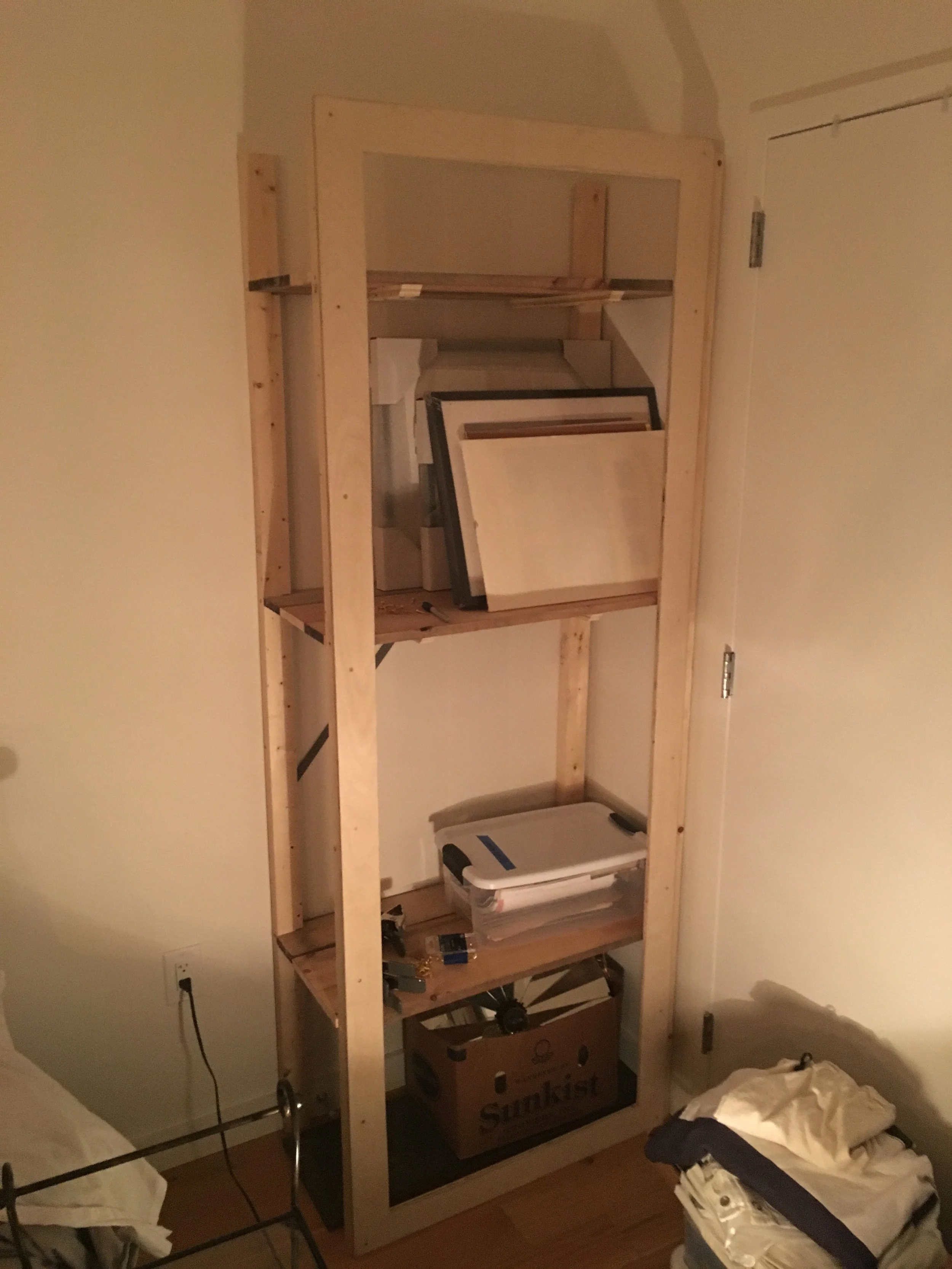   Wall-fixed “armoire” (when it was just an overbuild shelf)  