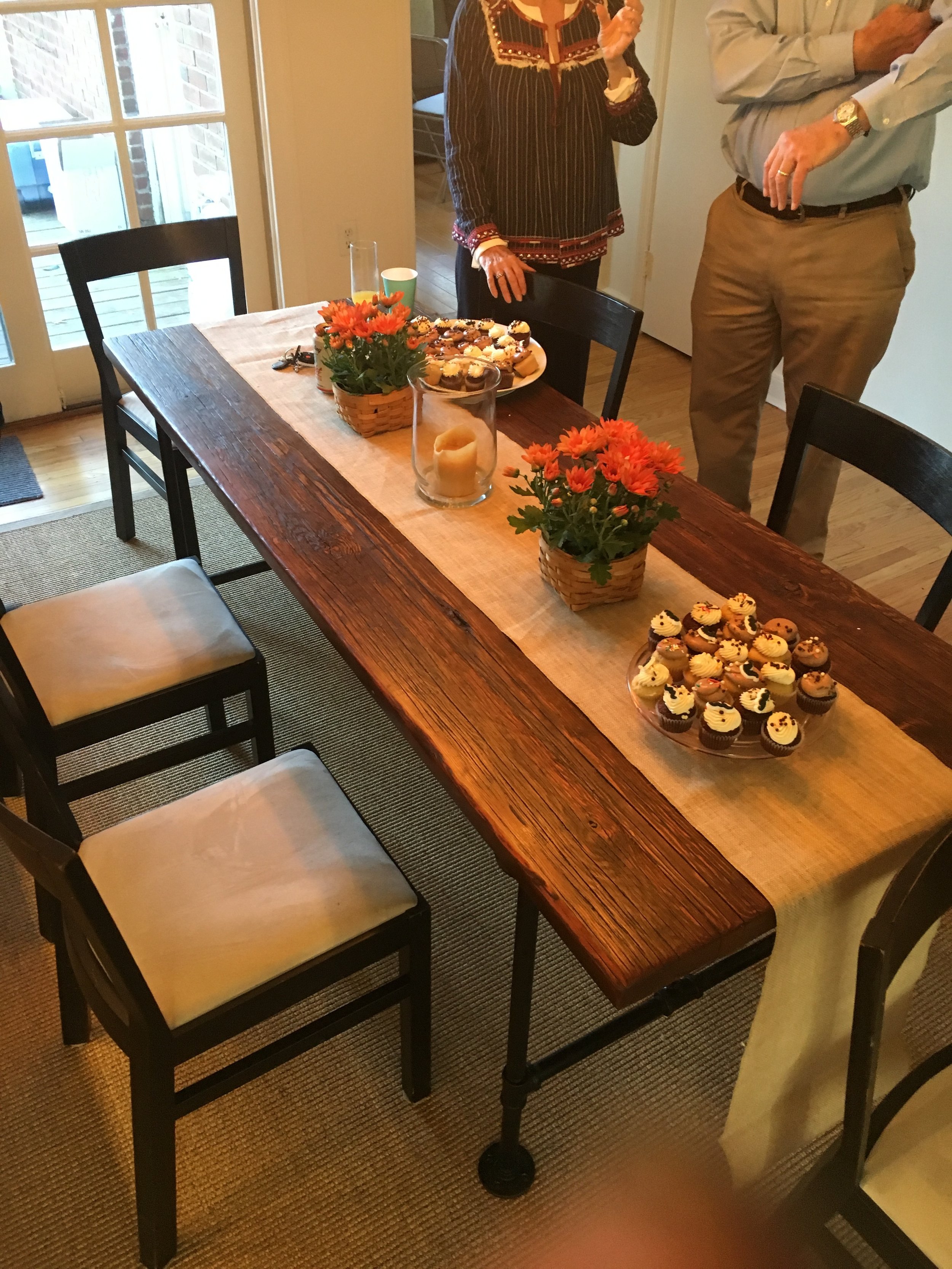   Dock board and steel pipe dinning table  