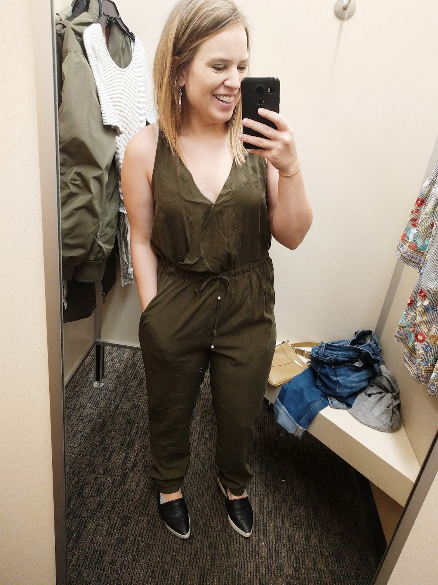  We went shopping for travel stuff and I tried on this jumpsuit for kicks. It was so awkward and made me look like I had Kim K's booty. So funny. 