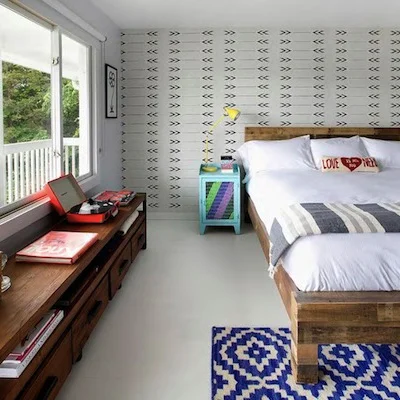 THE HOTEL DYLAN Designed by the Novagratzes , this stylish hotel in Woodstock feels like the kind of place we want to own one day, complete with graphic print decor and a communal fire pit on the front lawn. $219/per night.