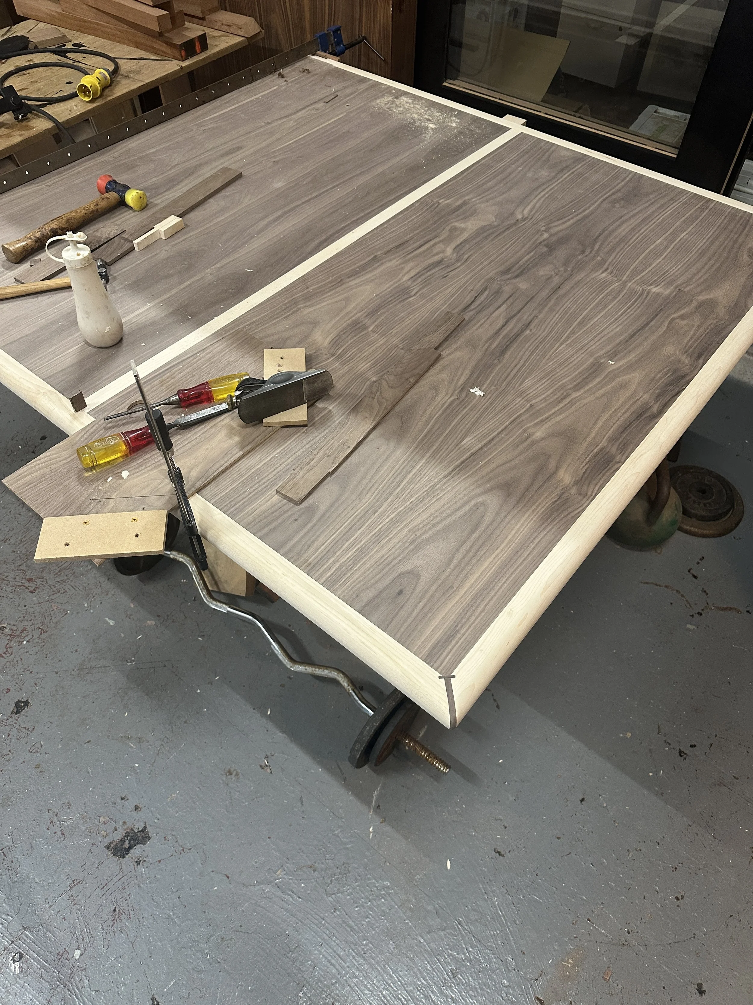 A walnut ping pong table…