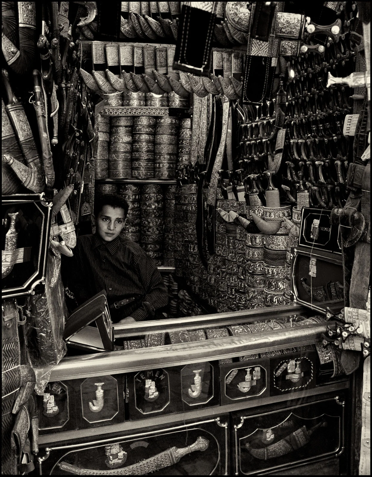 Young shopkeeper , Souq al Milh Sana'a 2007.