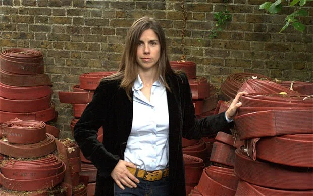 Kresse with the decommissioned fire hose from London