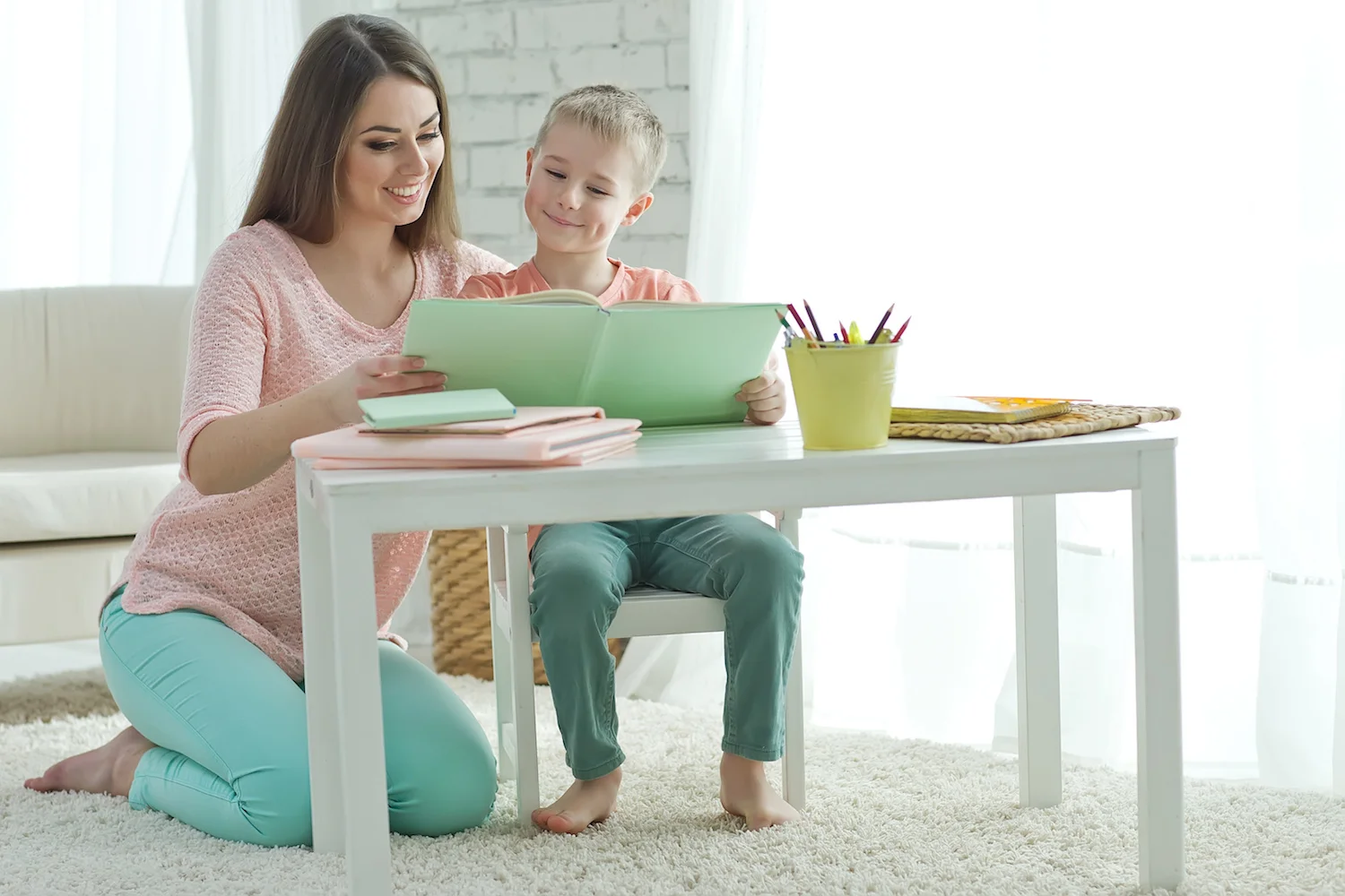 mom reading with boy.jpeg