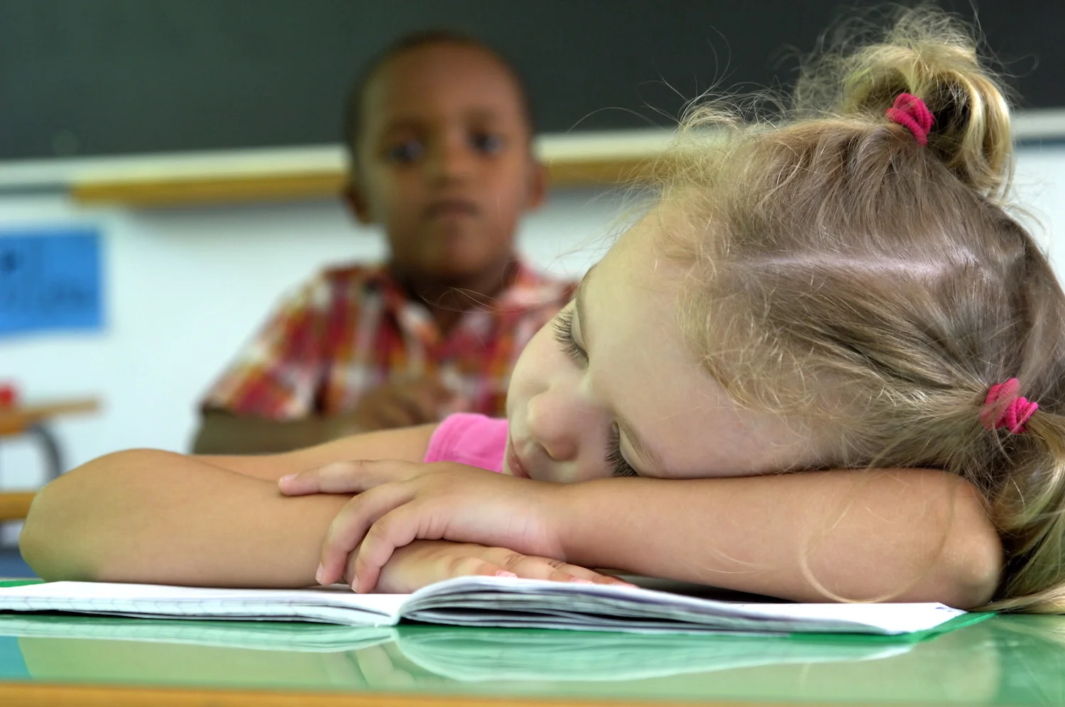 girl asleep at desk.jpeg