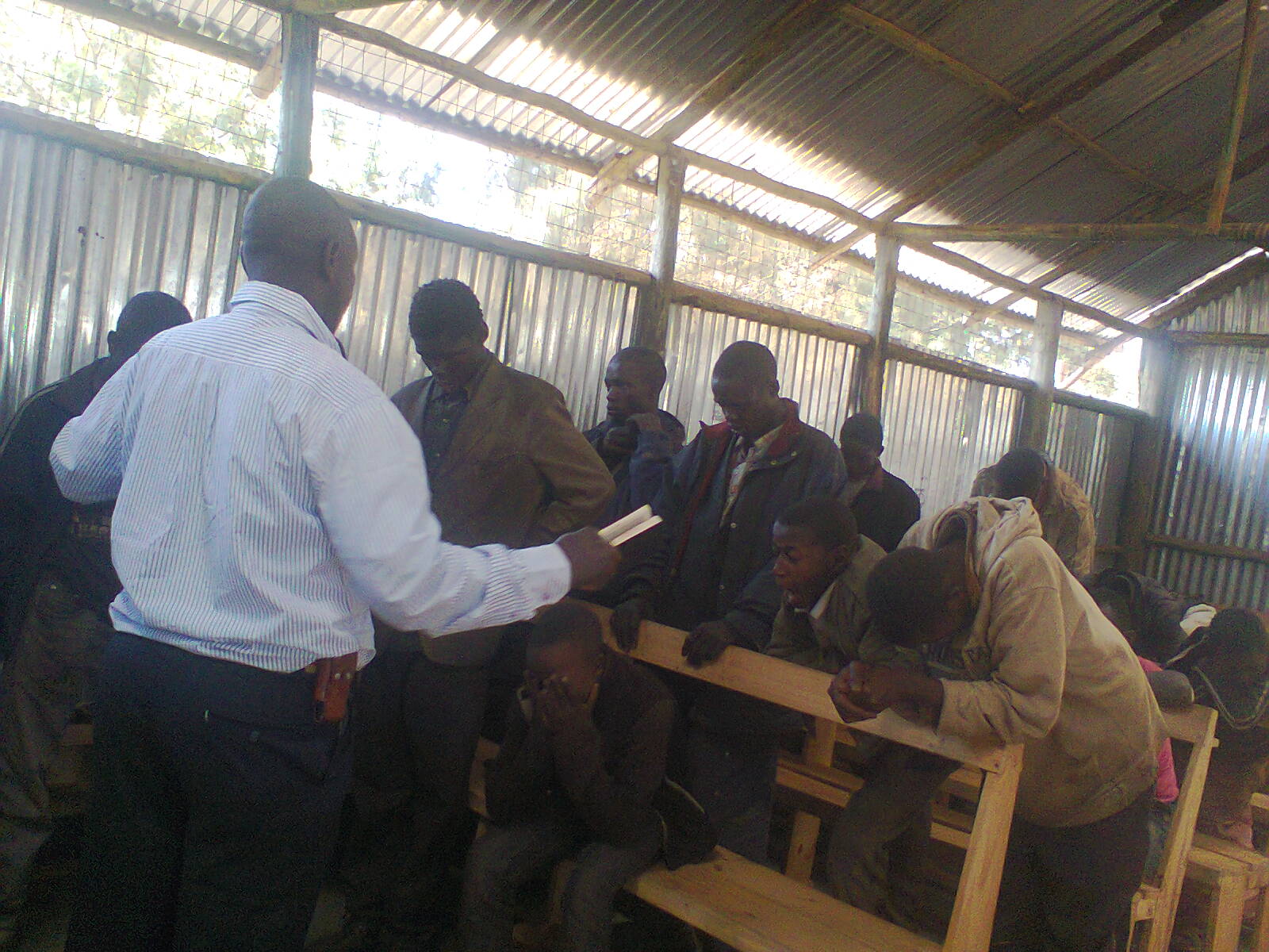 Church leader ministers to street children at outreach 
