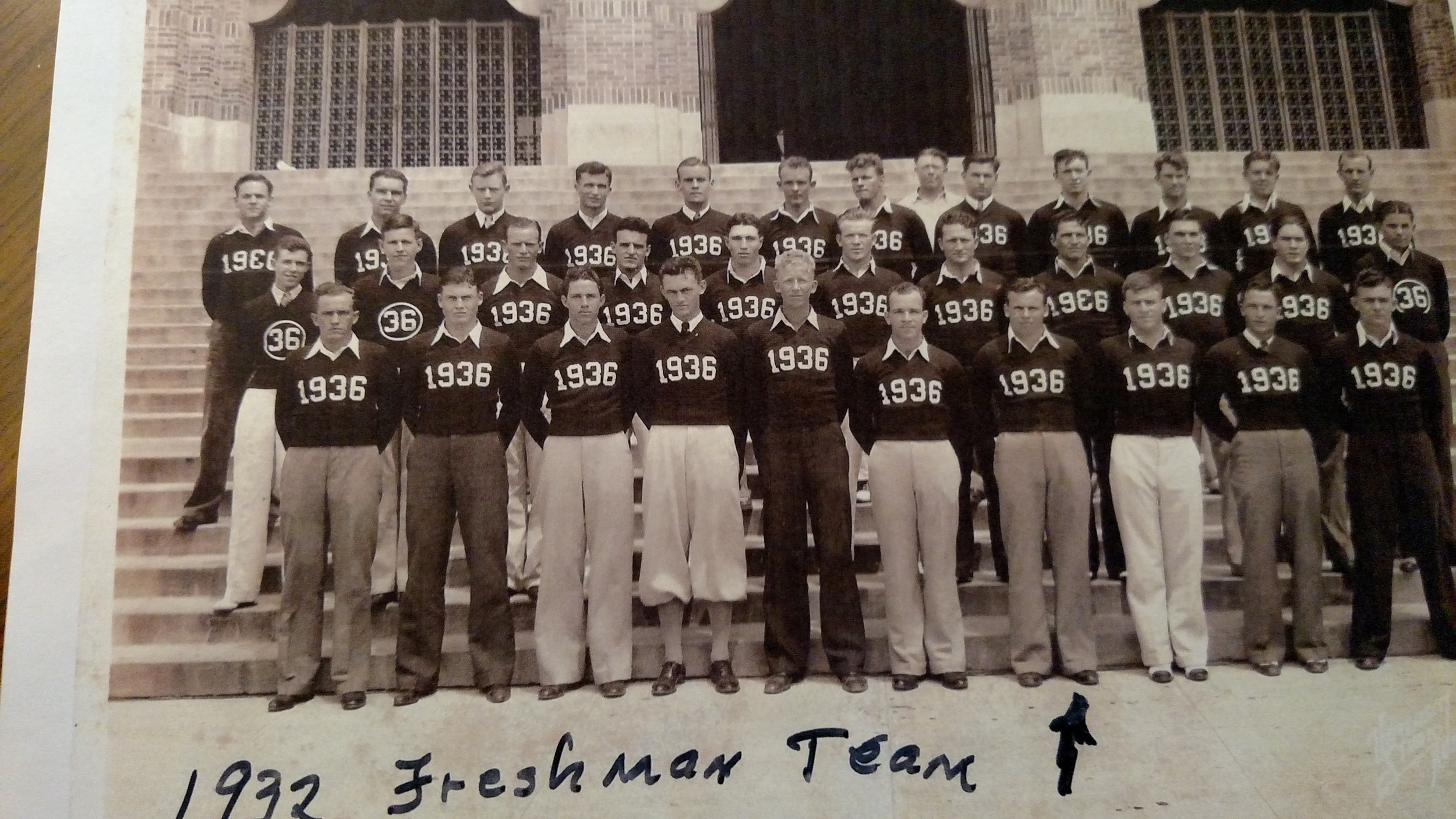 John Henderson is 4th from right on bottom row. As of September 2016 he is 103 years old in good health and very active. He is the oldest living Texas athlete of all time.