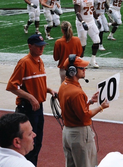 Darren Damewood holding card to notify defense of offense back # on the field.jpg