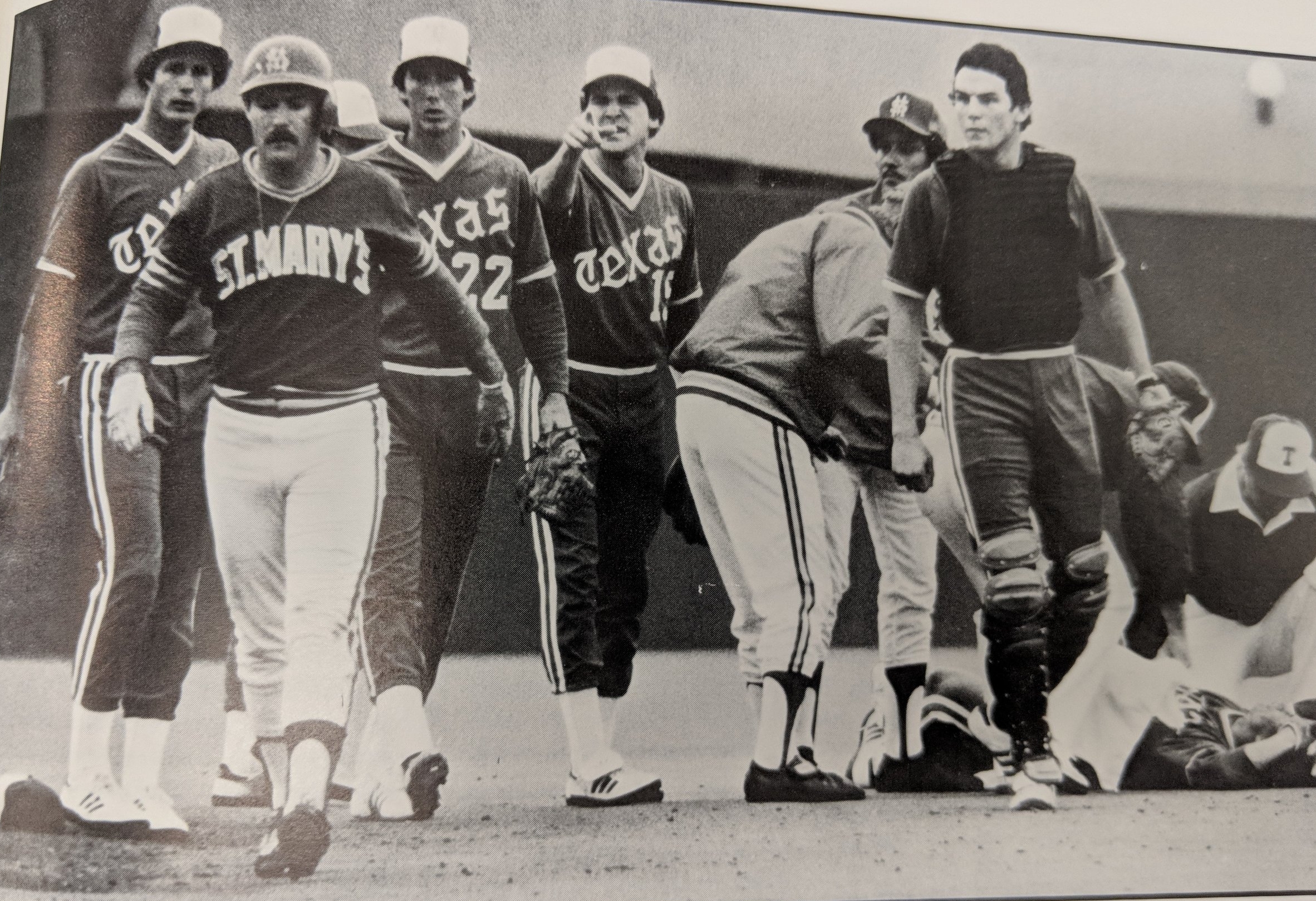 St. Mary's Steve Rambie walks away from second base as Texas players taunt him after a collision with Texas David Dean. David was lost for the season.