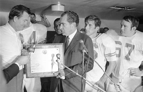  Former Captain of the Permian Panther and Longhorn State and National champions plus high school and College  All-American is number 67 in this photo. Glen is  on the podium with DKR, President Nixon, Juan Conde, and James Street after the 1969 Arka