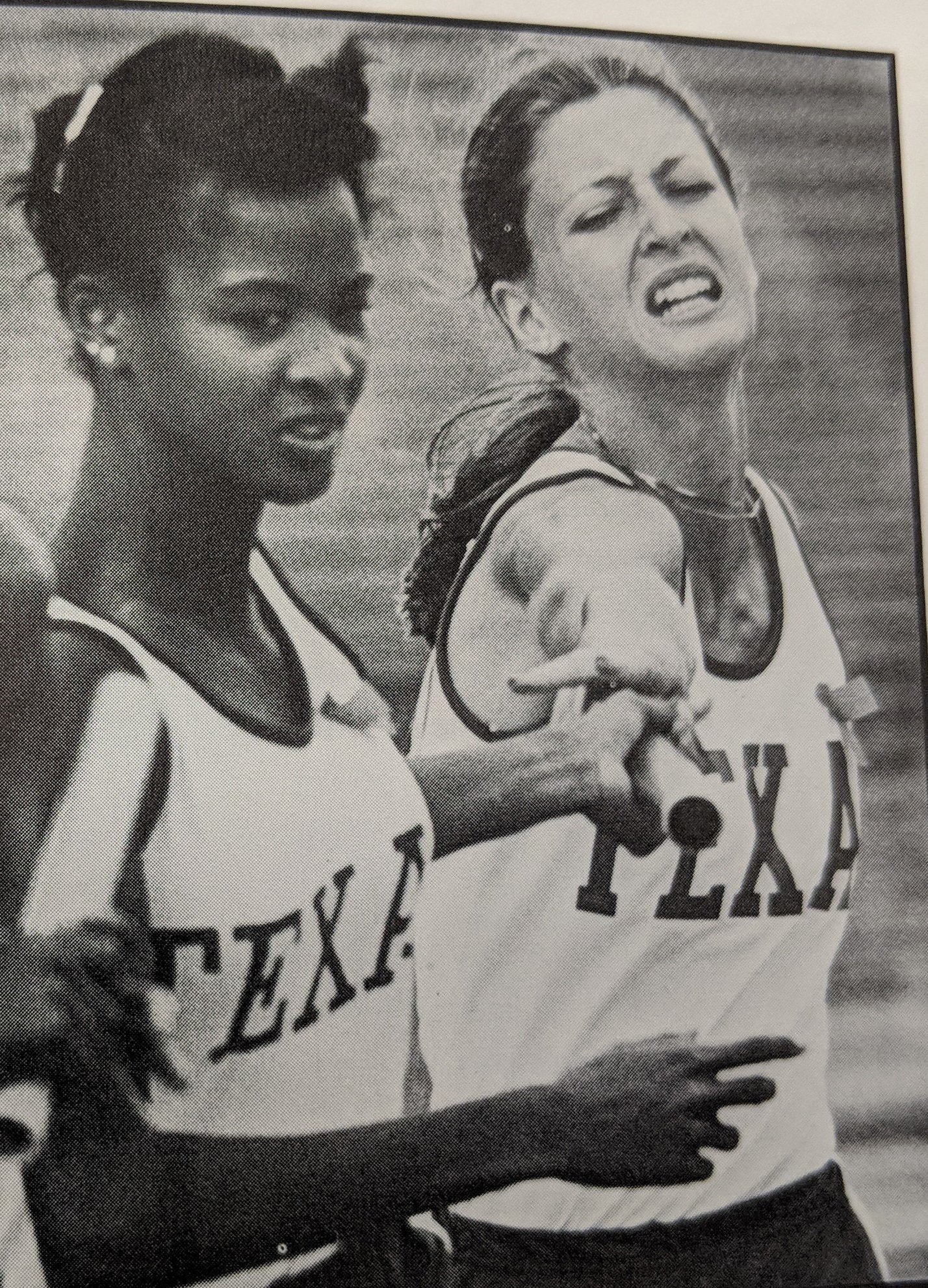  Donna Sherfield and Julie Holmes handoff in the 1600-meter relay.  Julie Holmes is recognized as a National Champion as a member of the 4  x 4000 in 1981, and she is a 5 time All-American  