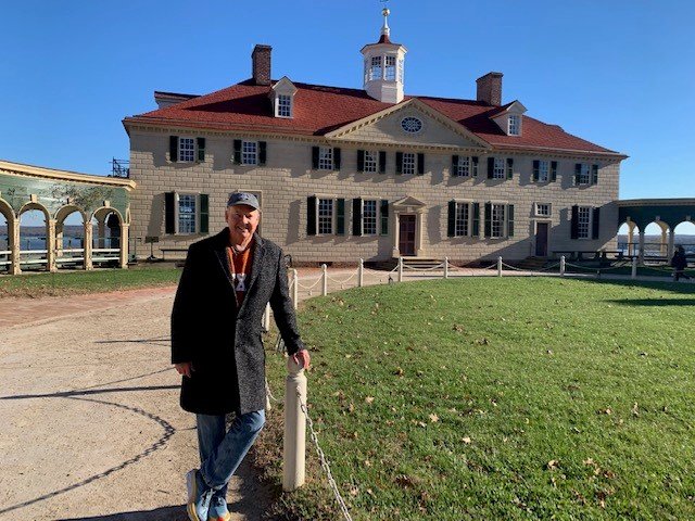 Larry Carlson near his dream home .jpg