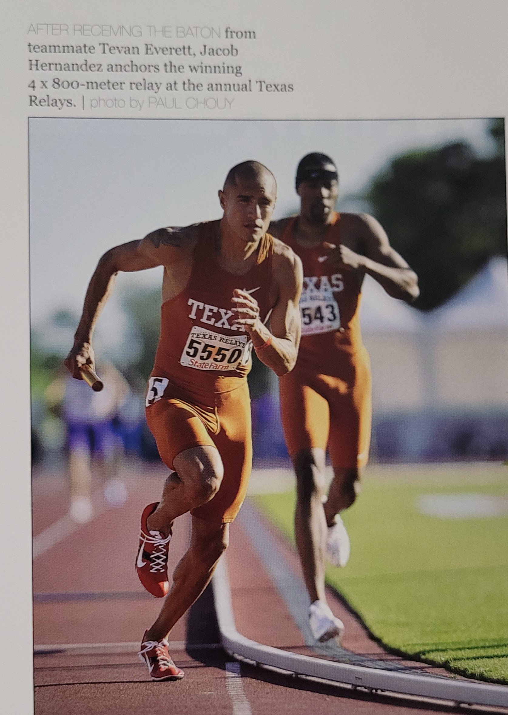  Jacob Hernandez takes hand-off from Tevan Everett  in the 4 x 800 relay 