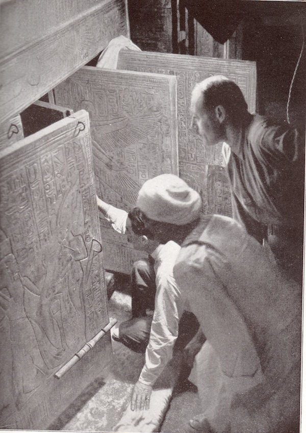 Howard Carter opening the third and fourth doors, KV62. Image: NY Times .