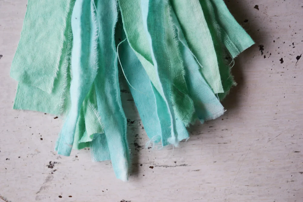 tassel clip in shades of aqua blue by Untold Imprint