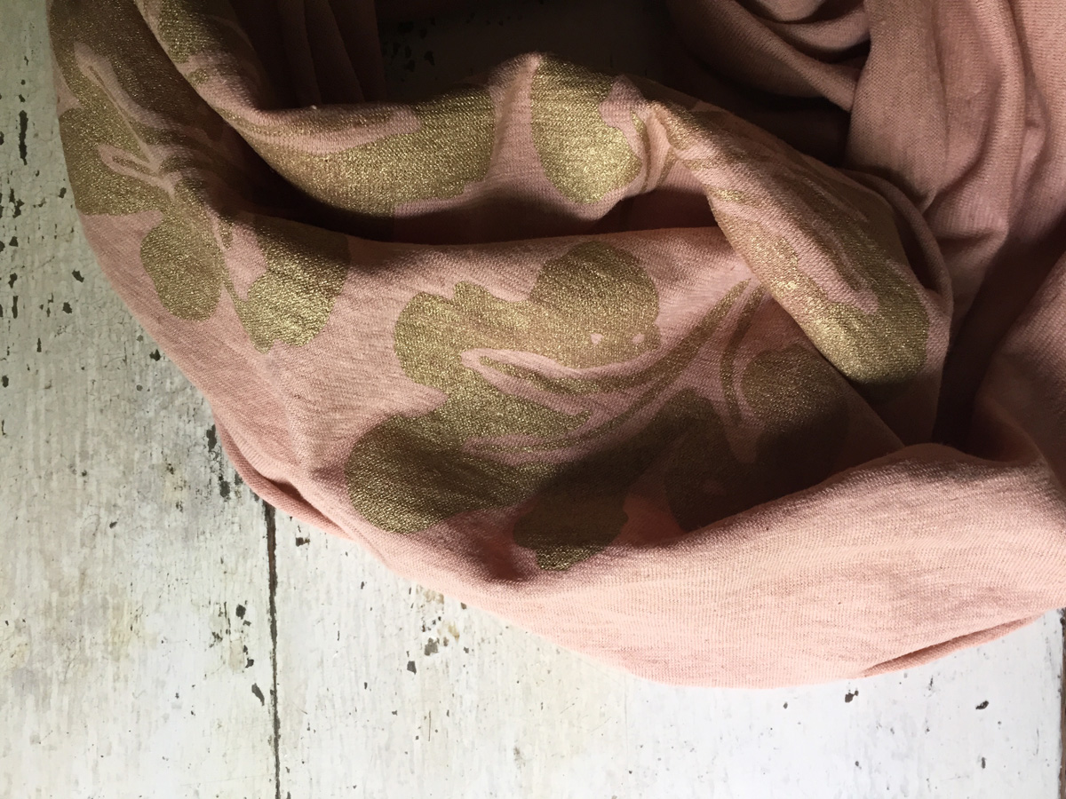 hemp/organic cotton jersey circle scarf dyed with avocado seeds and skins, printed with metallic gold ink.