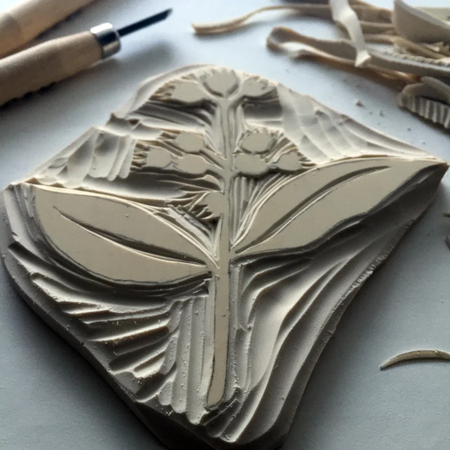 detail of block carving in process