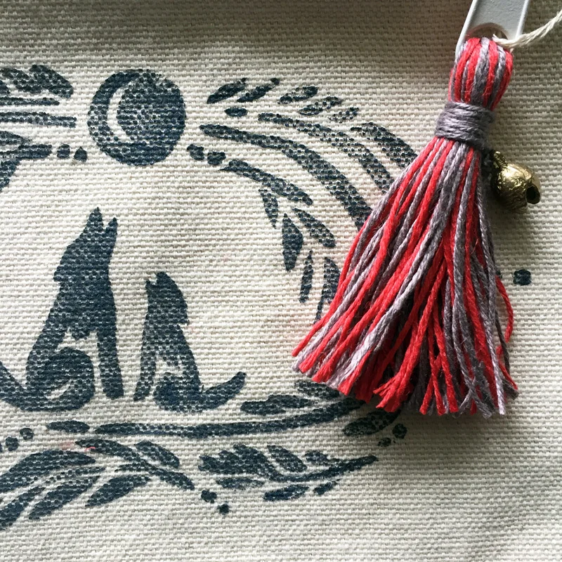 Canvas zip bag with block print of wolves 