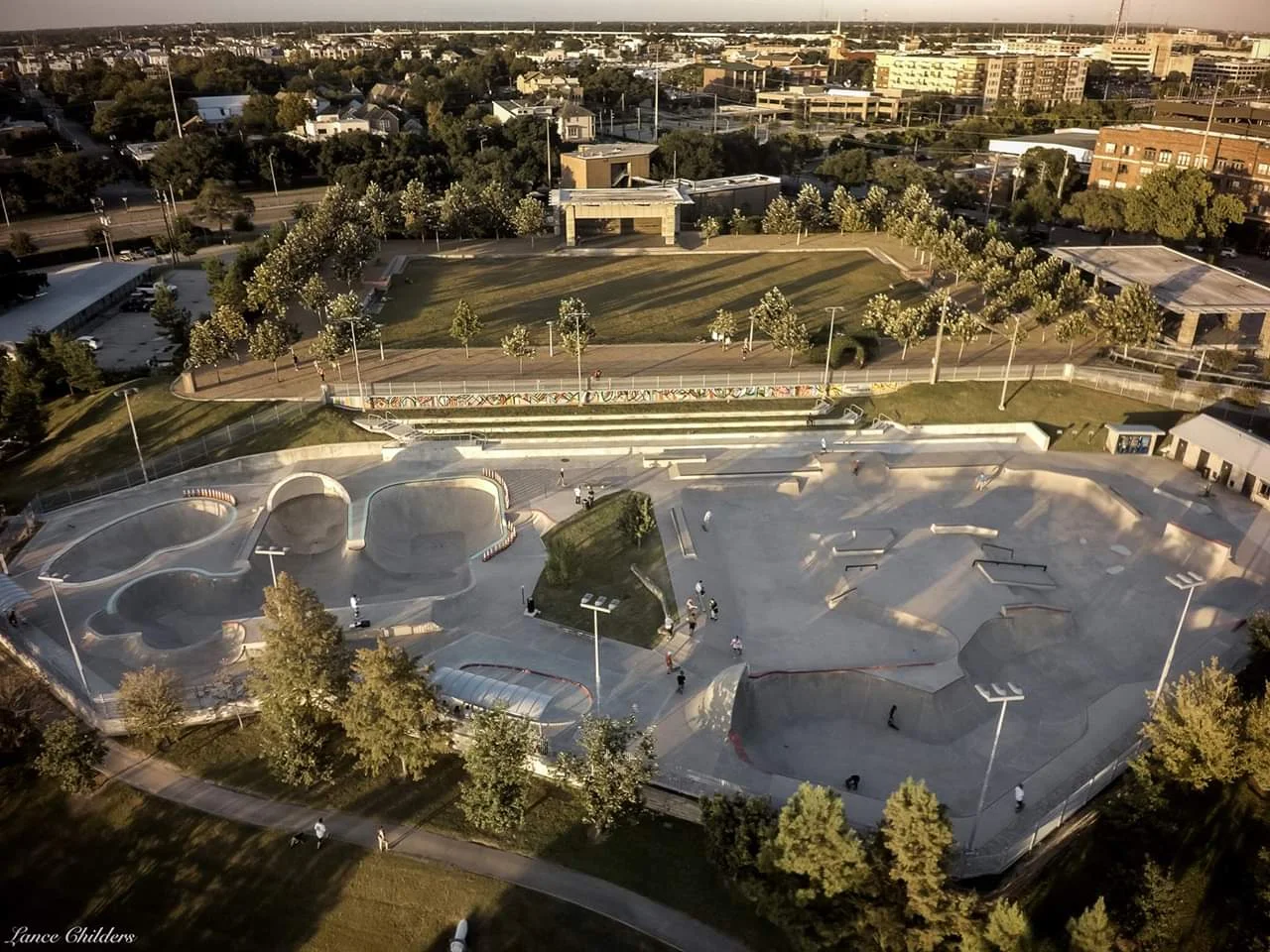 Built View of north art wall and terraced seating for spectators. Photography: Lance Childers