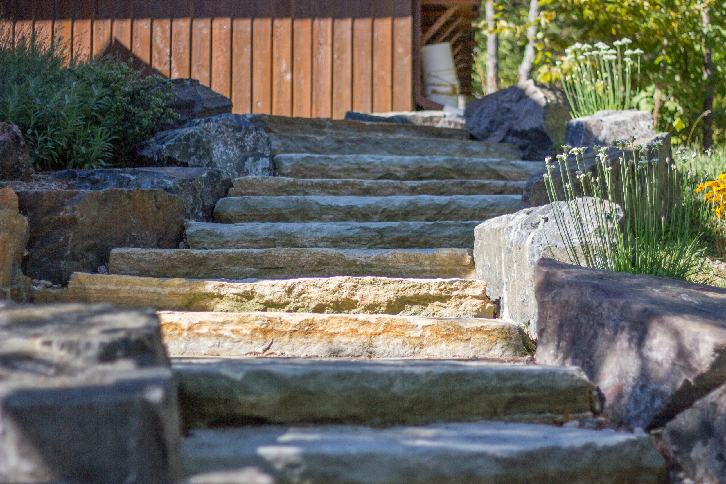 Tackaberry natural stone steps retained with Lanark granite.