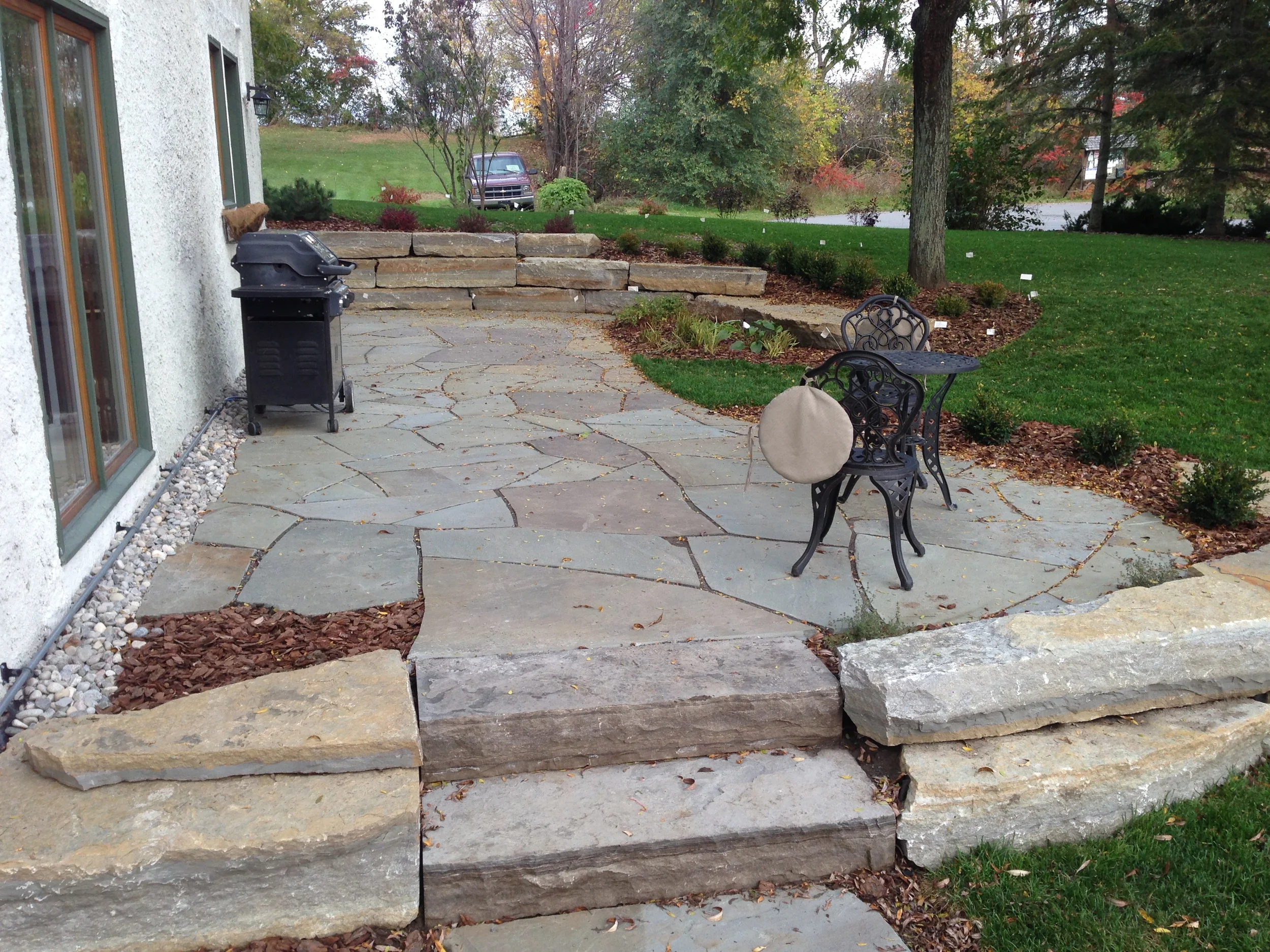  Pennsylvania flagstone patio with Tackaberry stone wall and Owen Sound steps. 