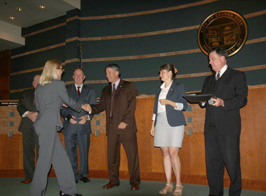 Christine-Hardin-Receiving-Outgoing-Commissioner-Certificate-fixed1.jpg