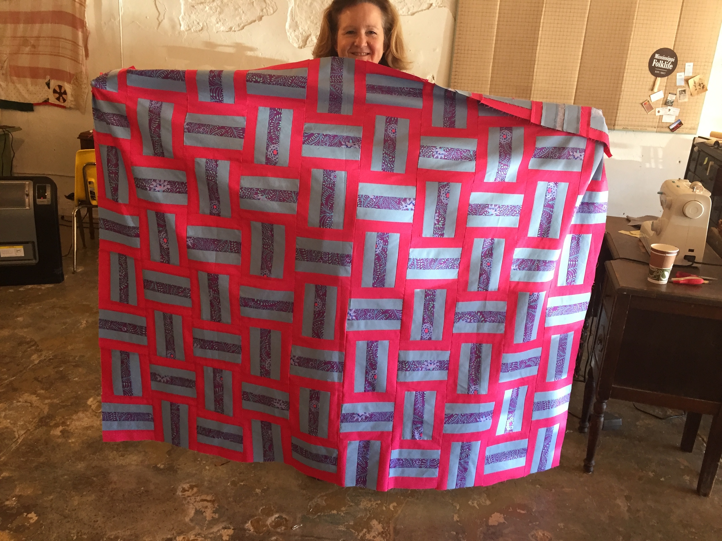 First-time quilter Susan Blackmon Watson with her terrific creation!