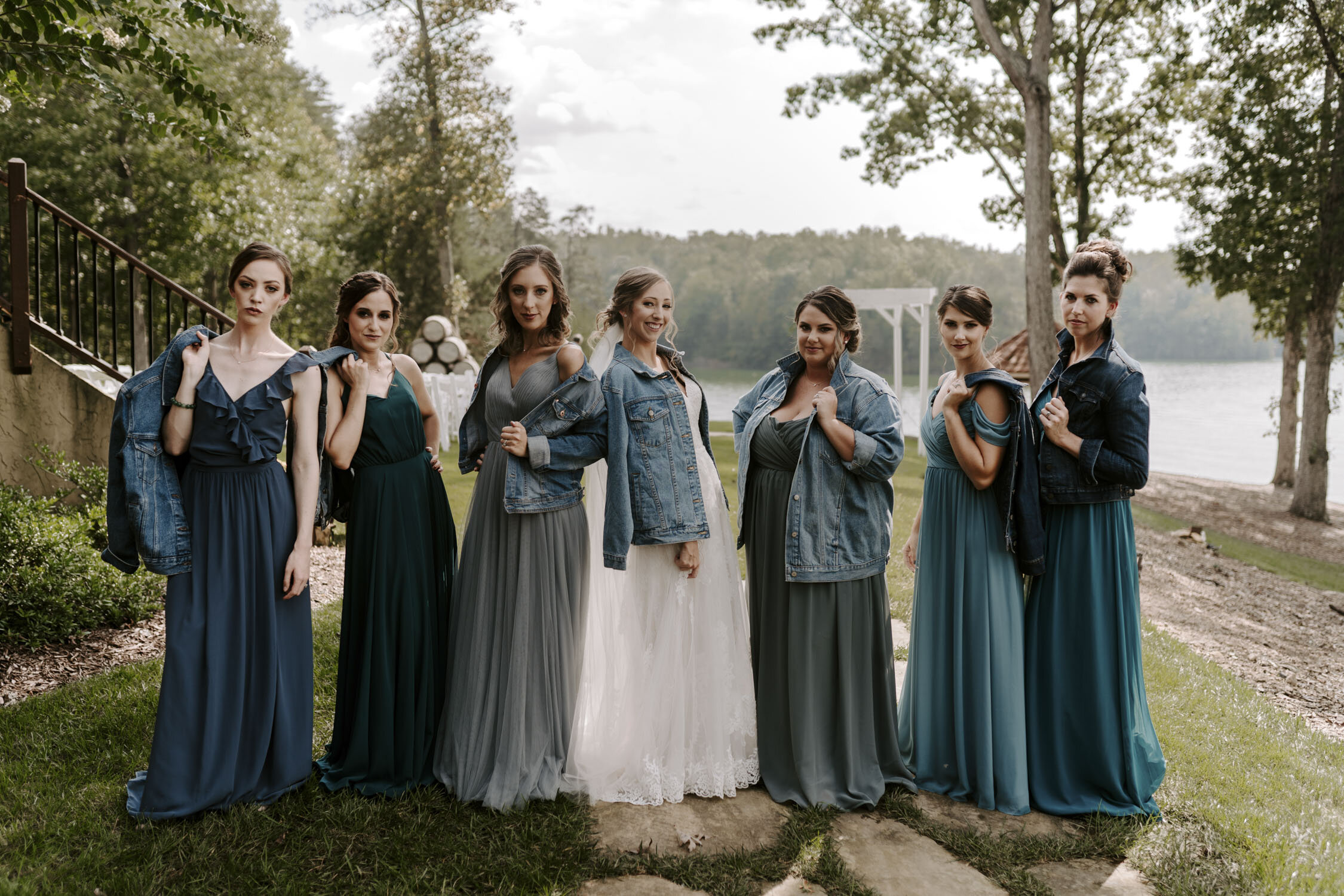 Fun Bridesmaids & wedding party portraits with cool denim jackets  at Bella Collina | By Greensboro, NC Wedding Photographer: Kayli LaFon Photography